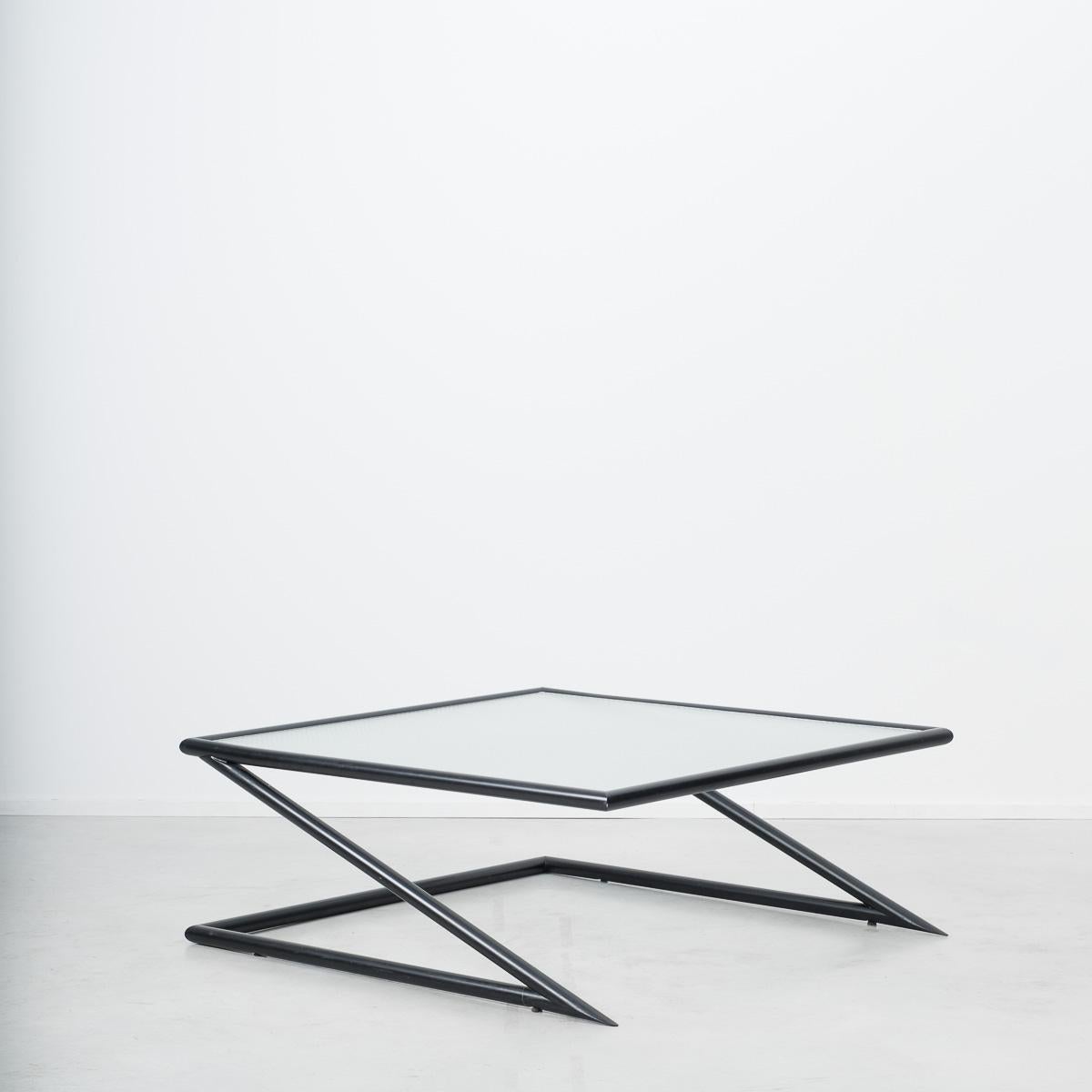 A pair of architectural tables manufactured by Dutch company Harvink in the mid-1980s. The gravity defying Z-design has a strong sculptural presence. The tables are a versatile size and equally appropriate for either side or coffee tables. The black
