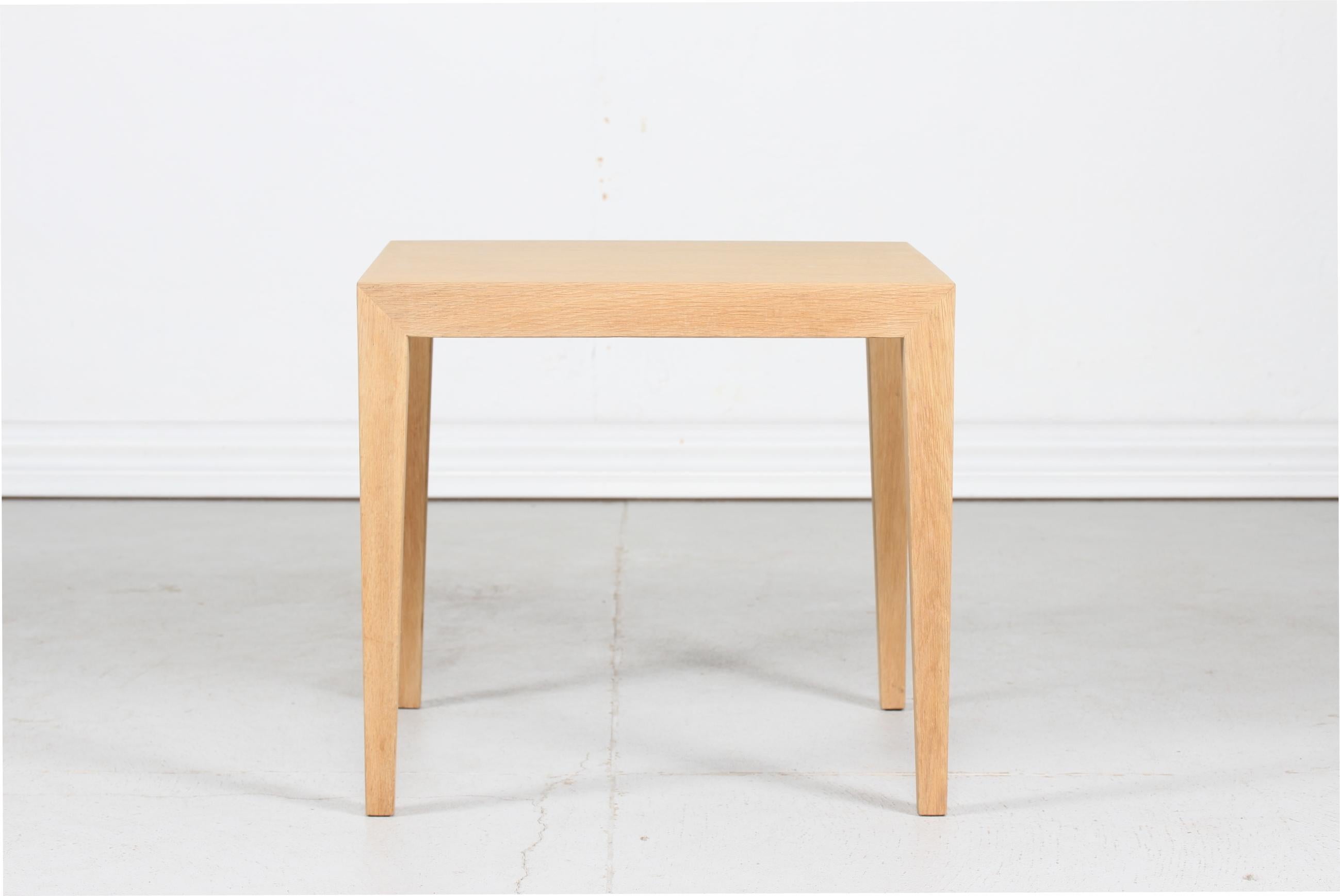 Danish modern square coffee table with pointed legs, designed by Severin Hansen Jr. and manufactured by Haslev Furniture

The table is made of oak veneer with soap treatment and remain in very nice condition.
  