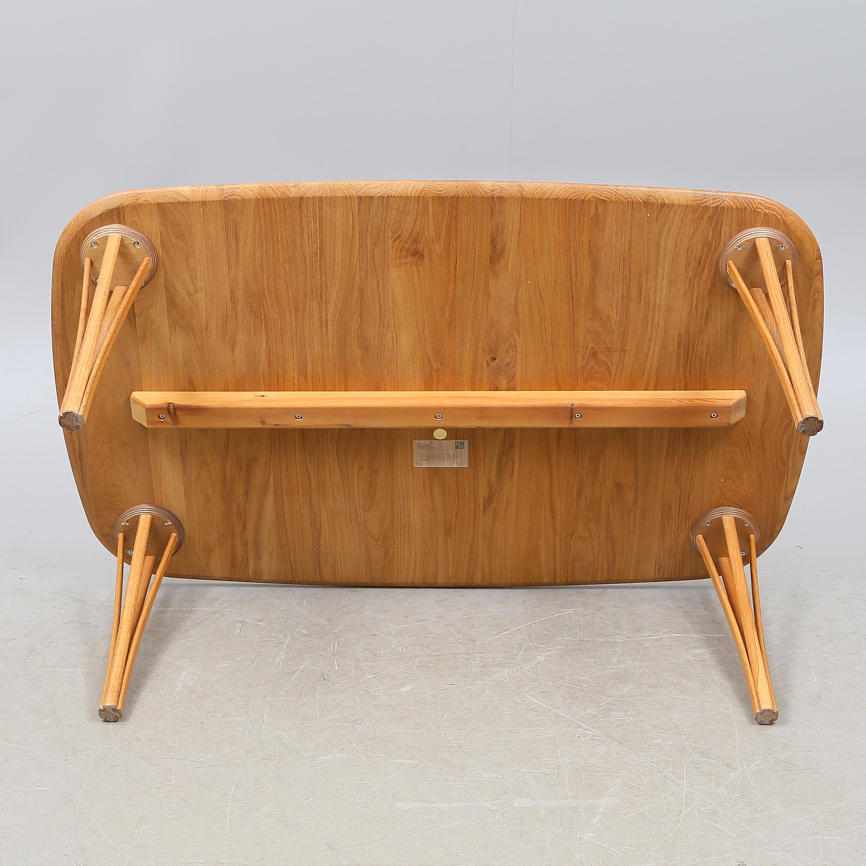 A sofa/coffee table with beech top and legs in Ash wood from 1984. 

More images, close-ups and detailed condition report available upon request.