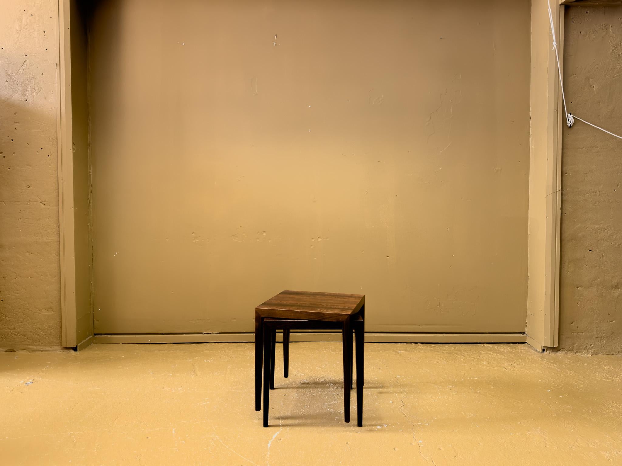 Handcrafted hardwood side tables from Danish furniture designer Severin Hansen in collaboration with heritage Danish manufacturer Haslev. These polished and lightweight side tables are an exceptional example of the understated, yet sumptuous, design