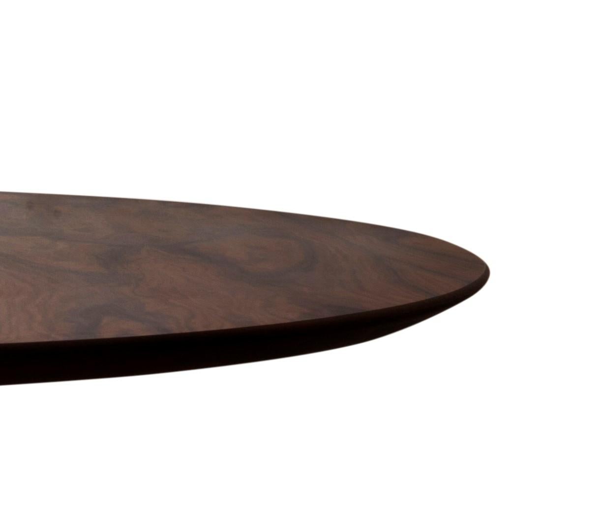 To create the Round Rods Dining Table, Alessandra Delgado was inspired by a childhood memory, the game of 
