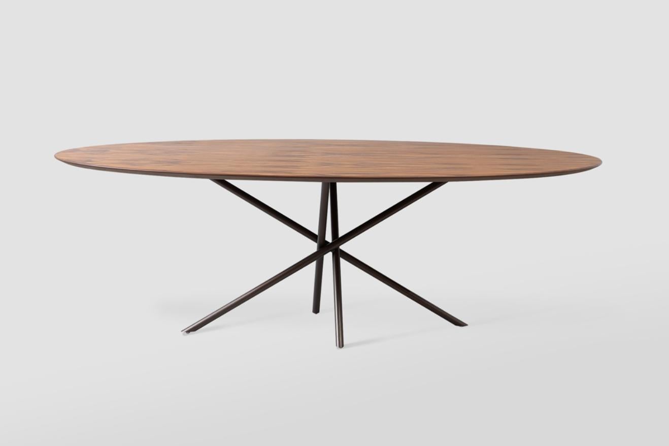 To create the Oval Rods Dining Table, Alessandra Delgado was inspired by a childhood memory, the game of 