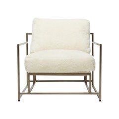 Sillón de piel marfil y níquel antiguo