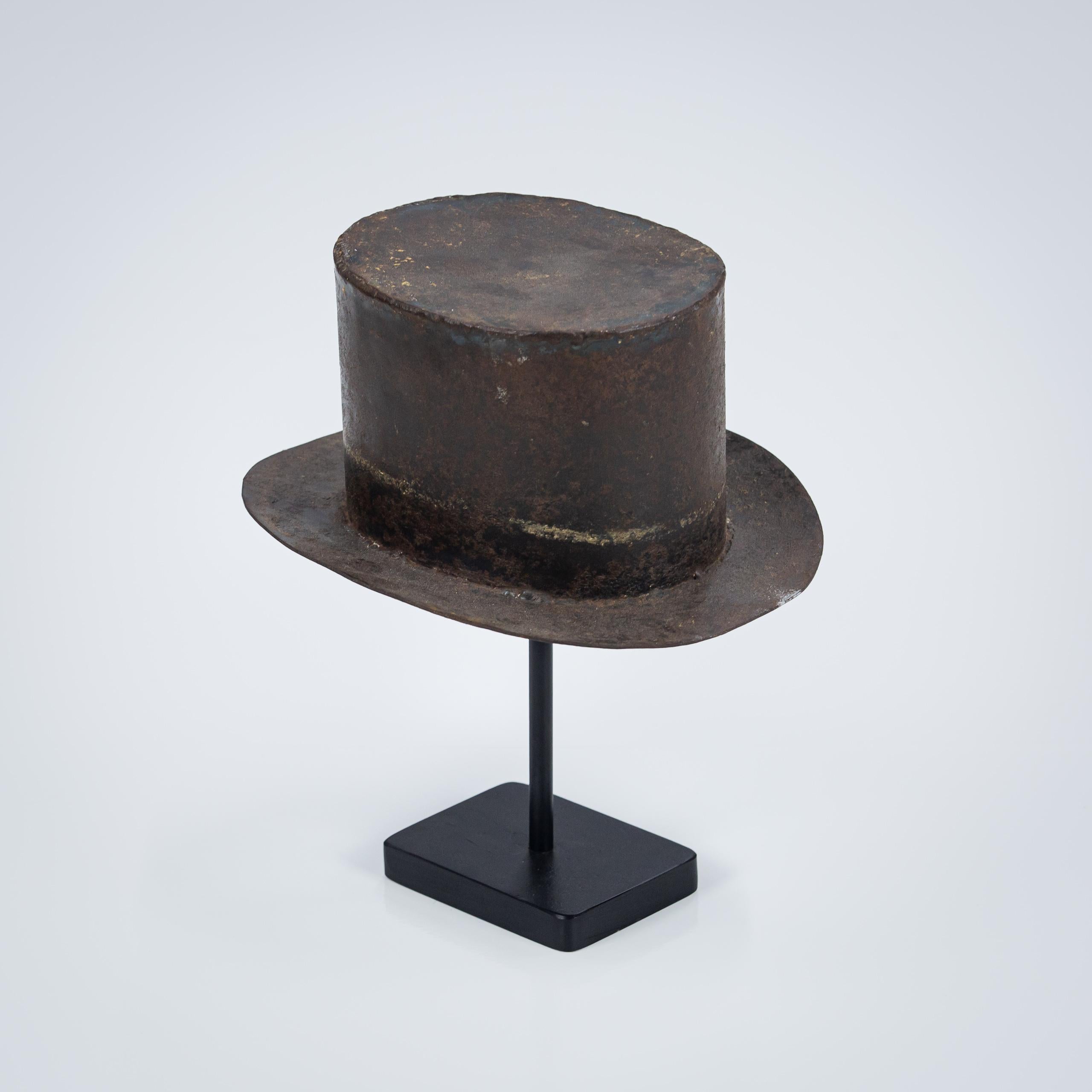 Early 20th Century Hat Makers Trade Sign or Advertising in painted, patinated Iron. Later stand.

France, Circa 1930.