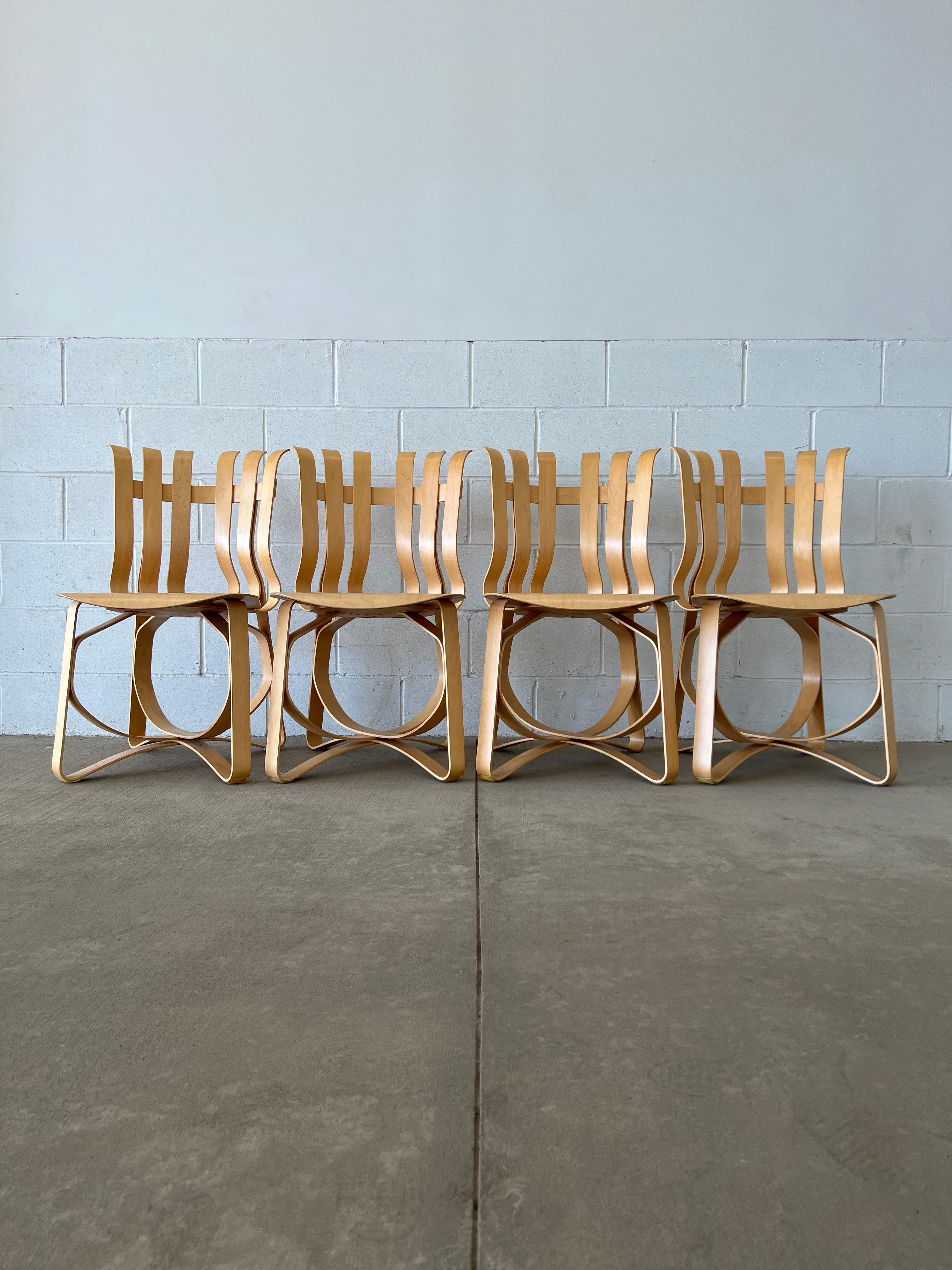 Inspired by the surprising strength of the apple crates he played on as a child, Frank Gehry created his thoroughly original collection of bentwood furniture. The ribbon-like designs transcend the conventions of style by exploring, as the great
