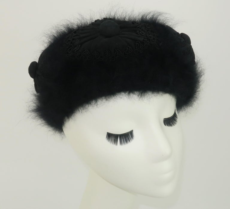 1950's Hattie Carnegie Original black angora beret style hat with sueded button decorations and ornate braid embellishments.  Ms. Carnegie was famous for dressing women from 'hat to hem' and actually started her fashion career in the millinery