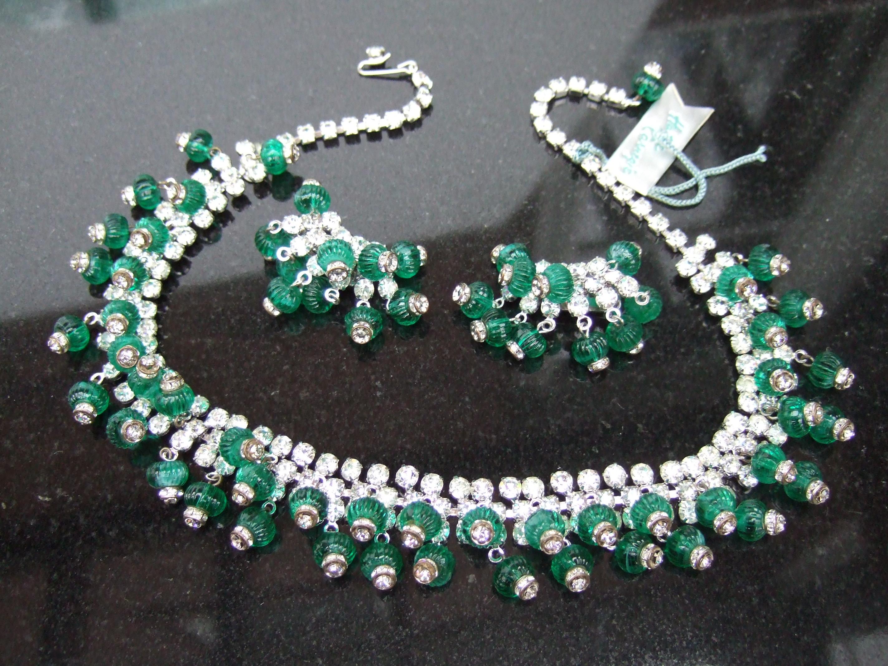 Hattie Carnegie Glass rhinestone choker necklace & earring set c 1950s 
The elegant midcentury necklace is paired with matching clip-on earrings
The choker style necklace is designed with two rows of diamante crystals;
embellished with two rows of