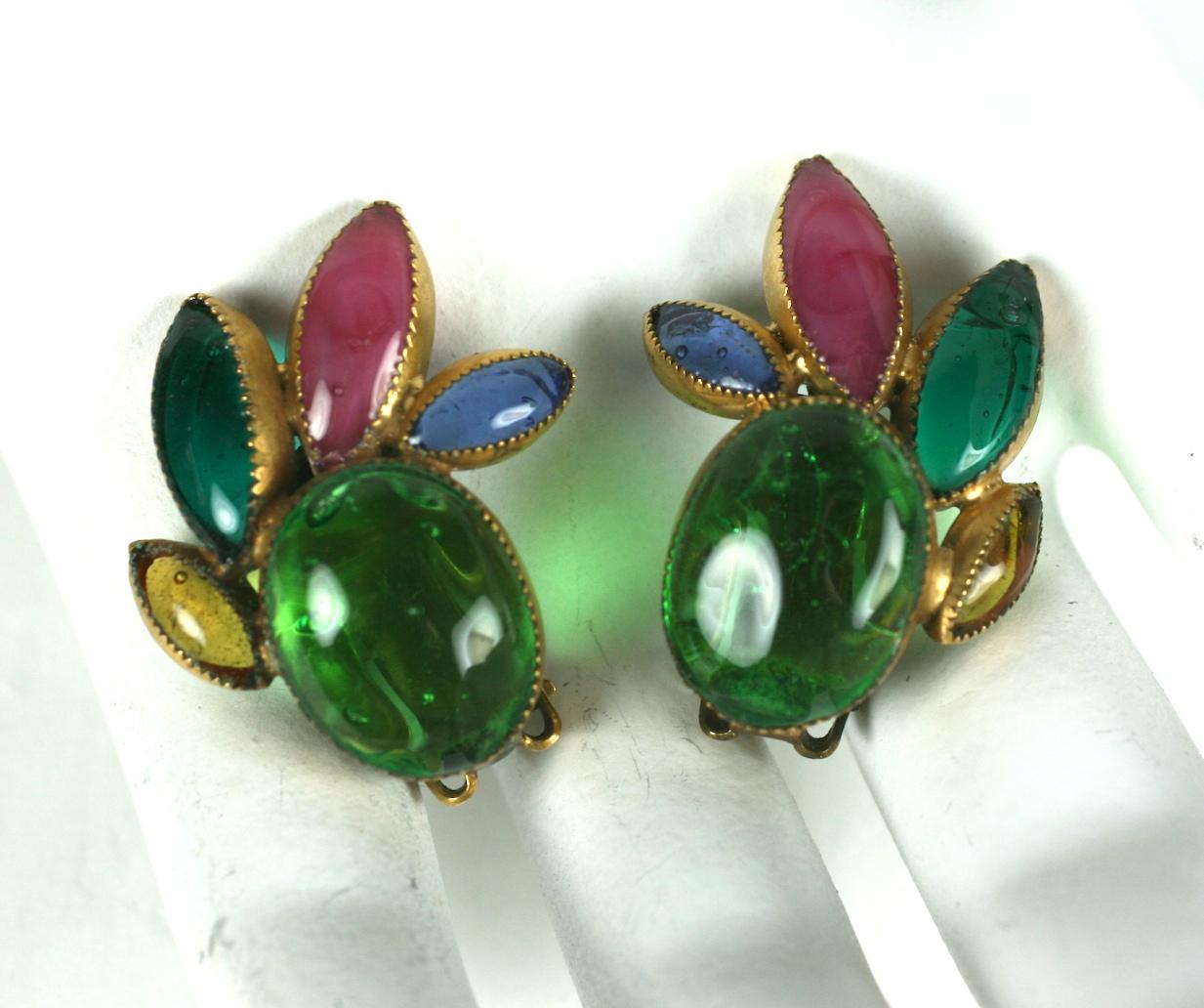 Hattie Carnegie Poured Glass Earrings from the 1950's. Made by Maison Gripoix with jewel toned poured glass and serrated settings. Clip back fittings. 1950's USA.
Poured Glass Made in France.
1.25
