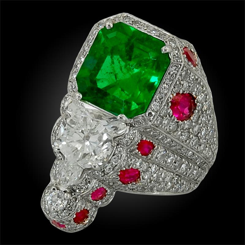 1950’s platinum diamond, ruby and emerald ring.
approximately 4 cts. of emerald and 2 cts. of diamonds
ring size – 4 3/4
 