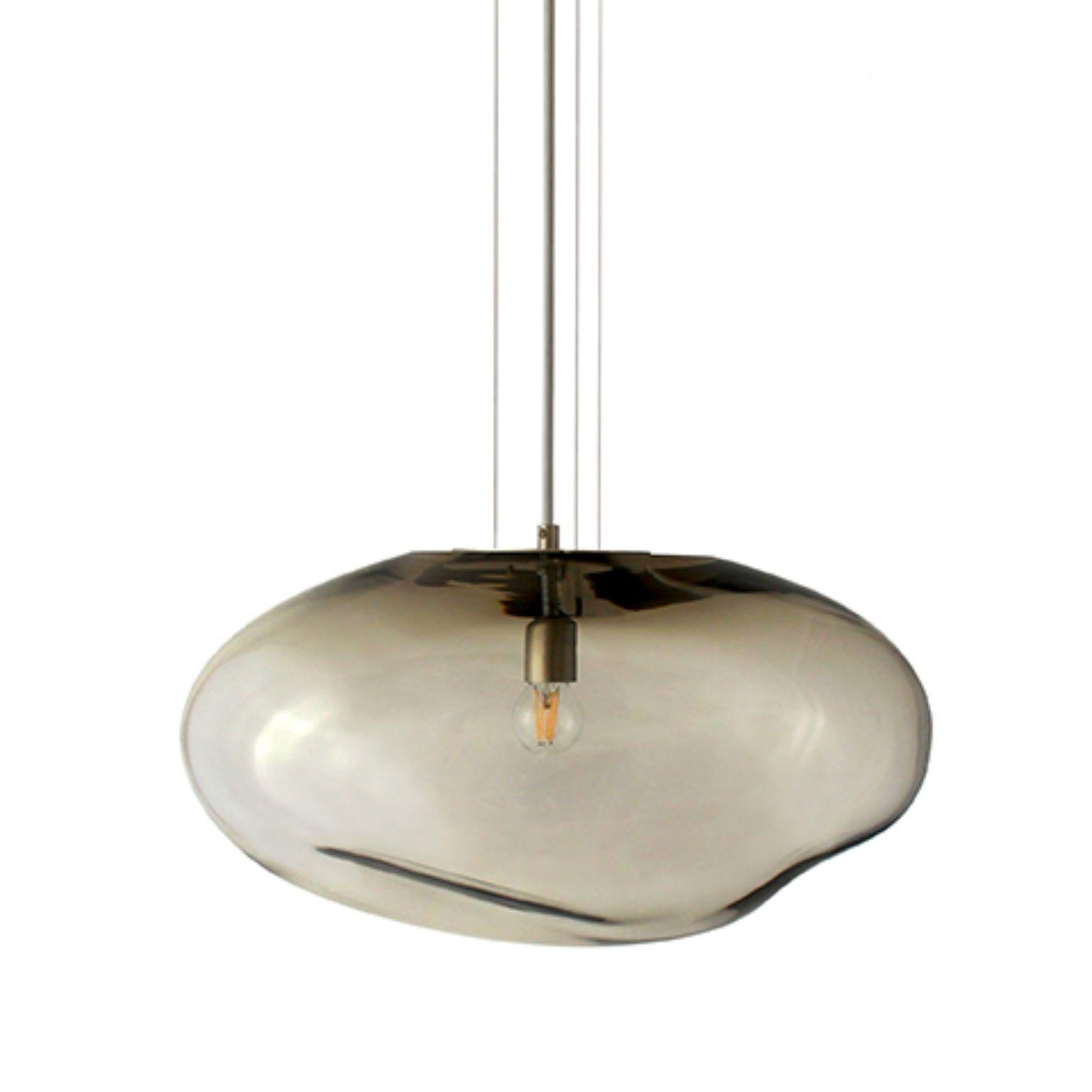 Haumea Amorph silver smoke L pendant by ELOA
Material: Glass, steel, silver, LED Bulb
Dimensions: D 27 x W 39 x H 30 cm
Also available in different colours and dimensions.

All our lamps can be wired according to each country. If sold to the