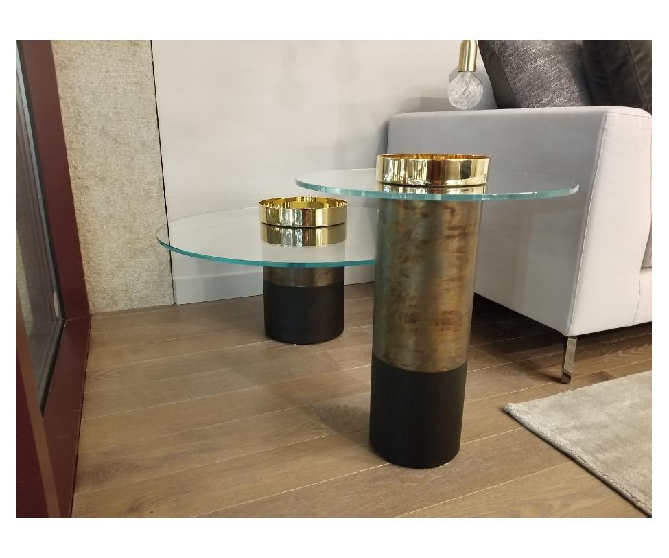 Haumea coffee table designed by Massimo Castagna

Coffee table in 10 mm transparent extra light tempered glass. Black(mod. layer) open pore or rust lacquered wooden base.
Bright brass, hand-burnished brass, coppered brass or black chromed metal