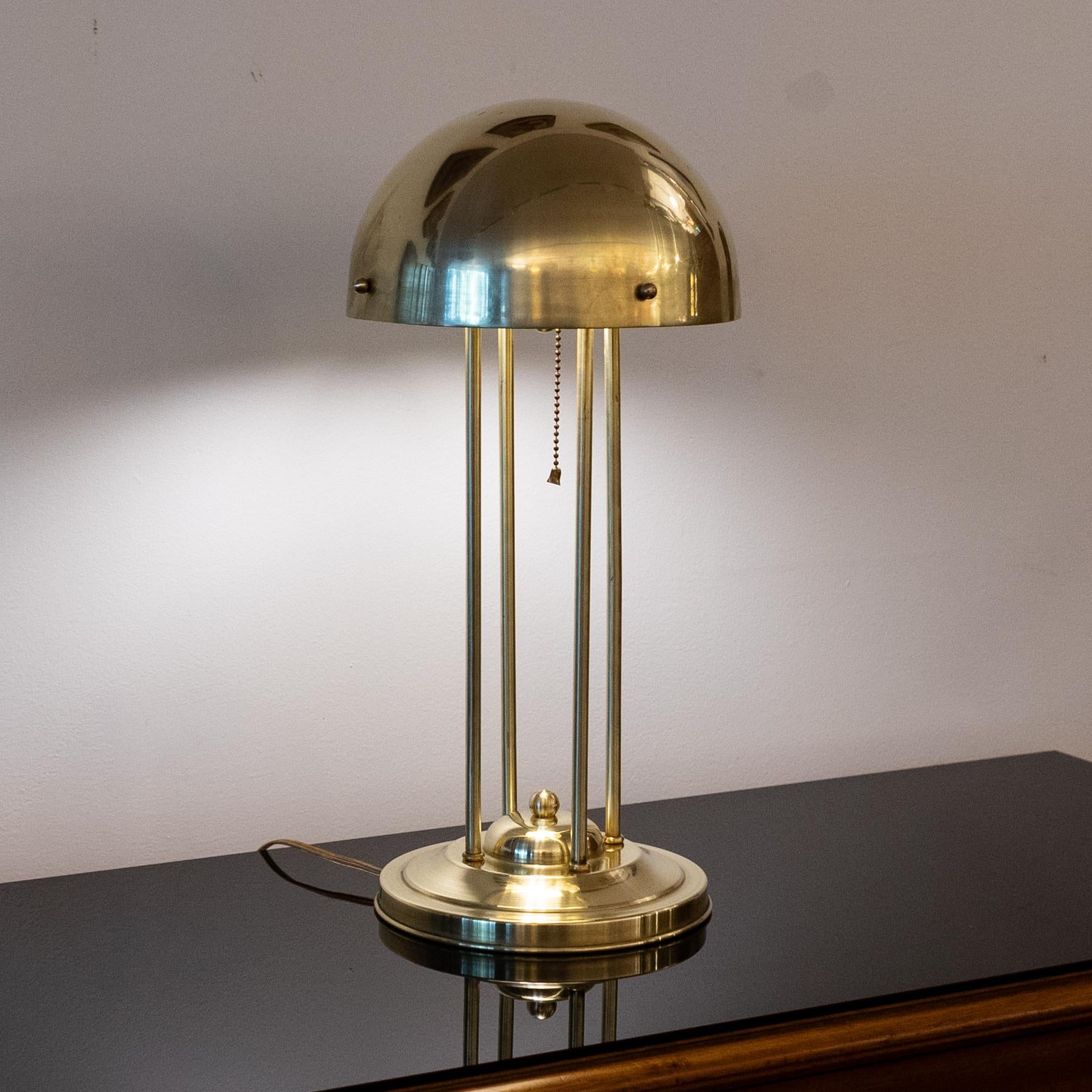 Art Nouveau table lamp designed for Haus Henneberg and designated HH1. Designed by Josef Hoffmann, 1902, Vienna, Austria. This is probably a later production from 1960s. 
Light fixture has been rewired for US and mounts one medium base A19