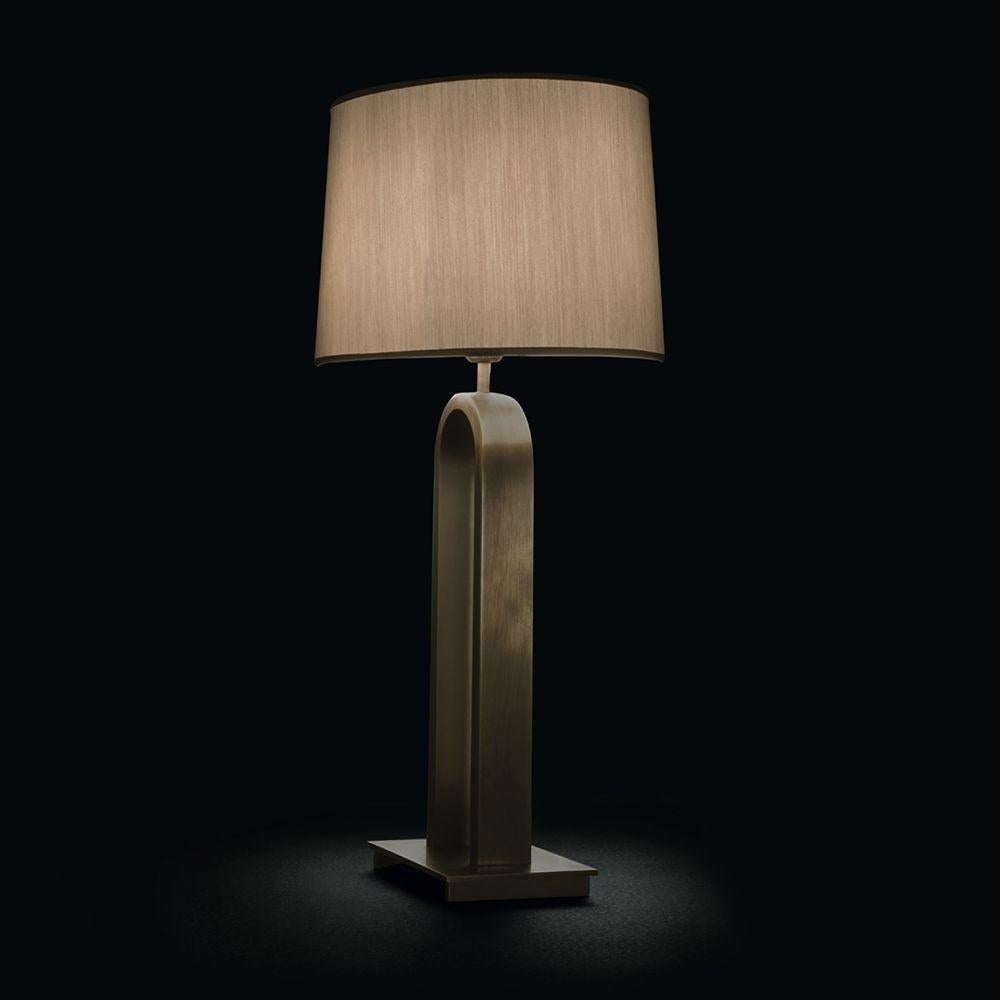 The Haussmann Large Lamp by Hugues Chevalier is a timeless and sophisticated addition to any interior. Its unique bell-shaped design brings an elegant touch to your space. Handcrafted with high-quality materials, this lamp not only provides ample