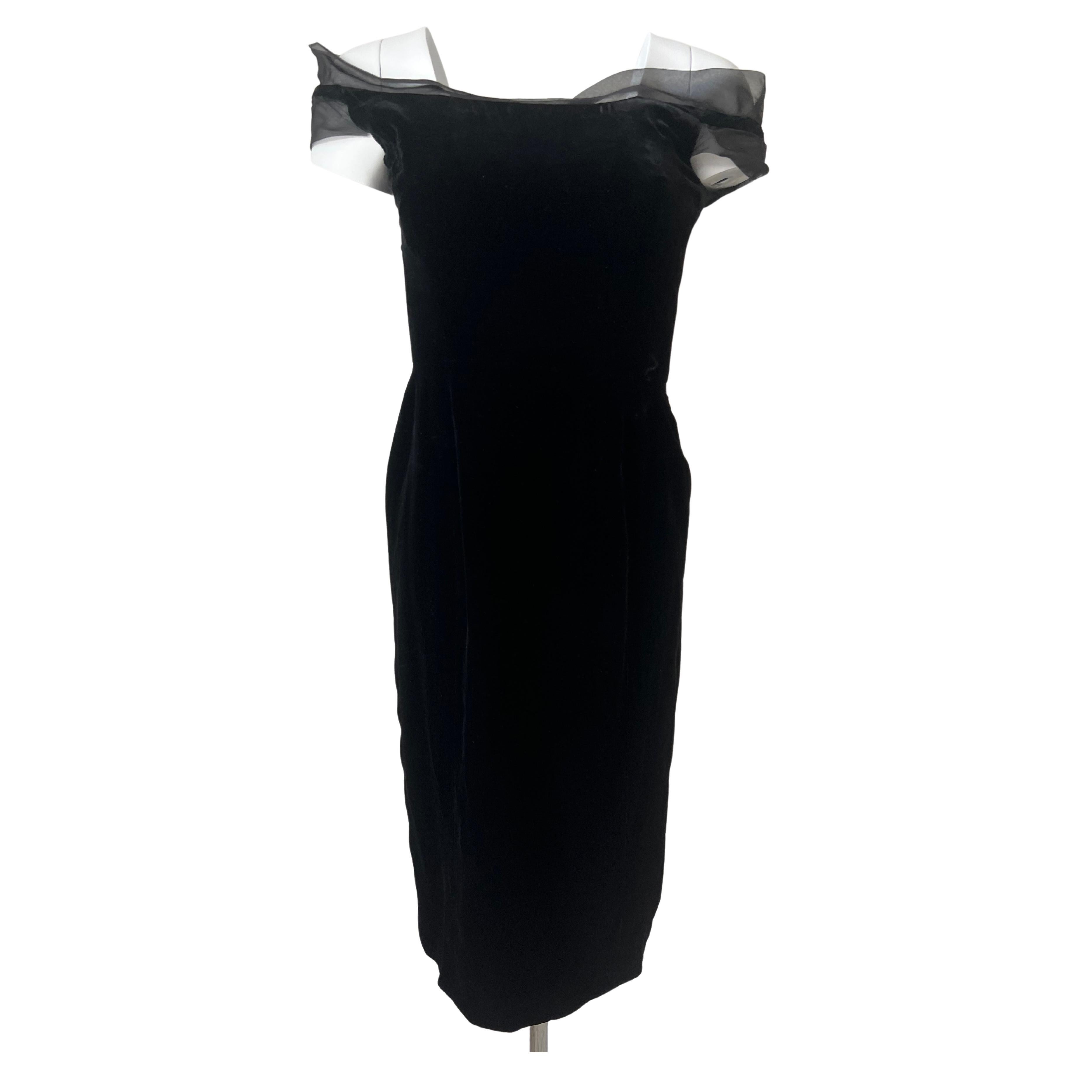 Beautiful cocktail dress in black velvet with silk tulle on the shoulder .
Haute couture by Pierre Balmain Paris, numbered under the tag, 

Pierre Balmain was born on May 18, 1914 in Saint-Jean-de-Maurienne, Savoie. His father Maurice Eugène Balmain
