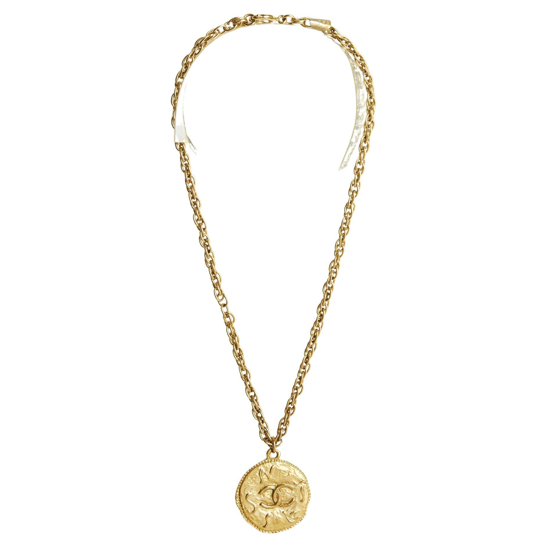 Haute Couture golden CC medallion For Sale