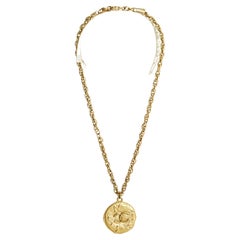 Haute Couture golden CC medallion