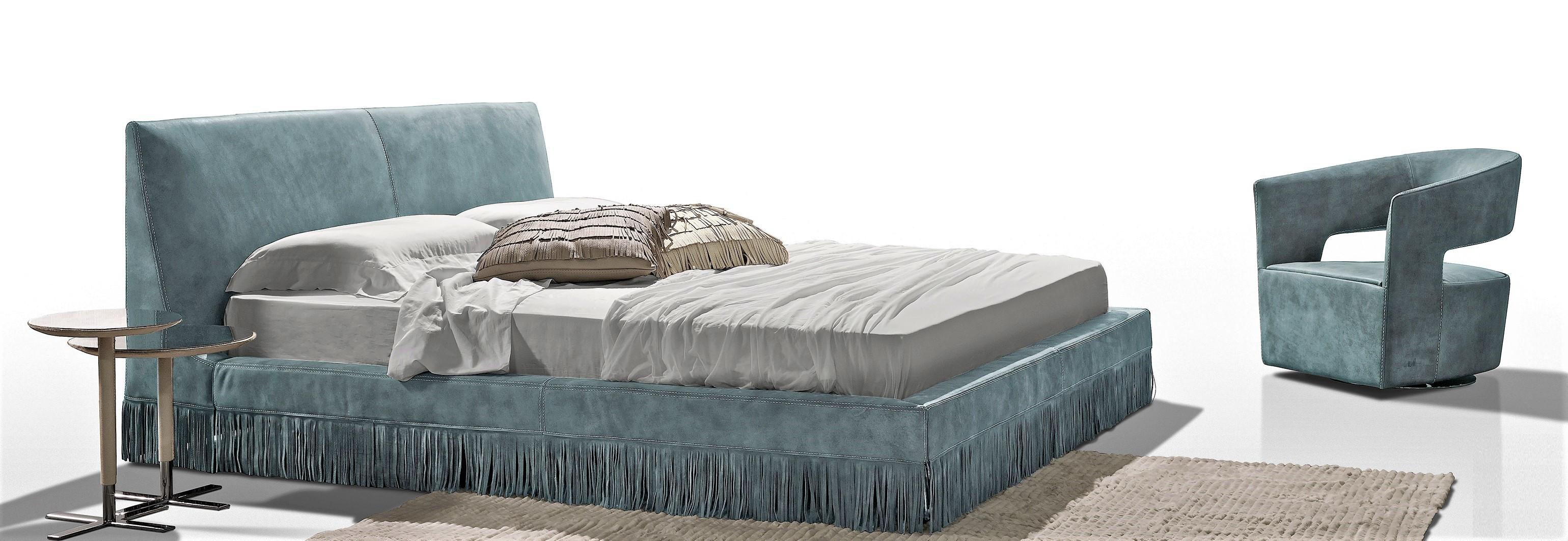 Couture, glamorous and tailor made this king size bed is full of contemporary flare and on-trend detailing. The high quality use of leather hide is complemented by an opulent fringe skirt that surrounds the bed along the base. 

Dipping into the