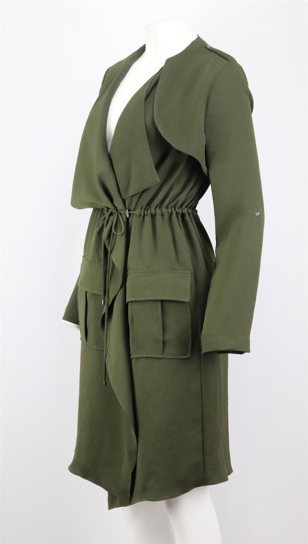 This trench coat by Haute Hippie fits for a relaxed fit, this cinched in trench coat is cut from textured fabric that falls off your shoulder with a drawstring waist to give the illusion of a belt. Green polyester. Slips on. 100% Polyester. Size: