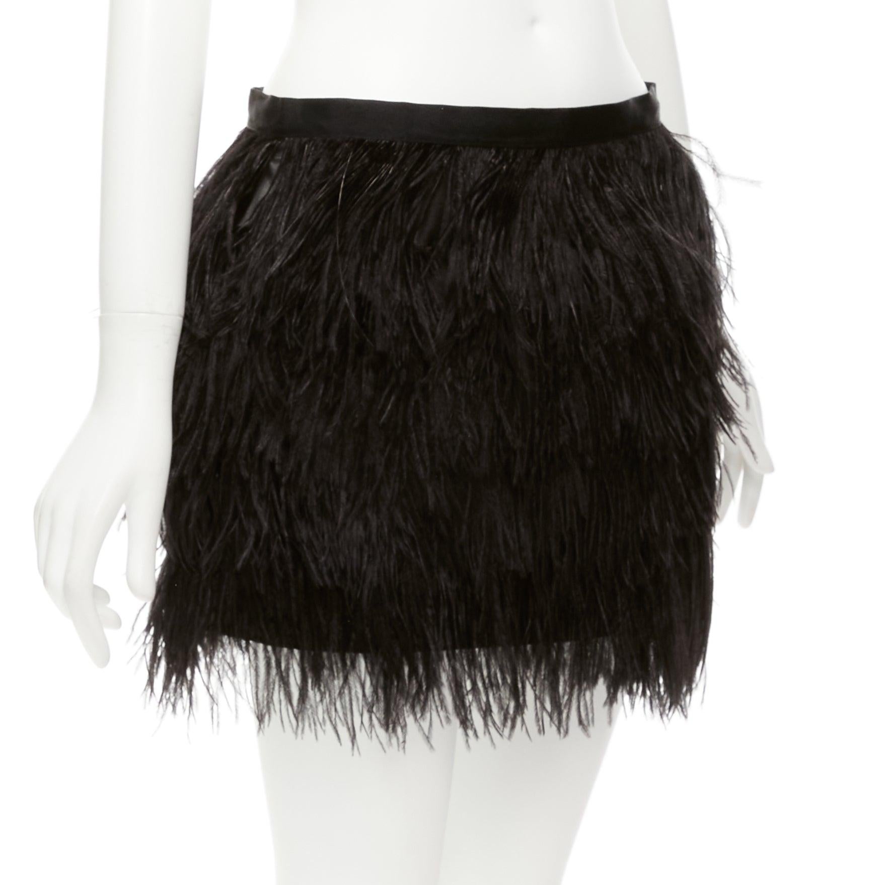 HAUTE HIPPIE black rooster feather silk lined mid waist mini skirt XS
Reference: NKLL/A00221
Brand: Haute Hippie
Material: Feather
Color: Black
Pattern: Feather
Closure: Zip
Lining: Black Silk
Extra Details: Domesticated rooster feather. Silk lined.