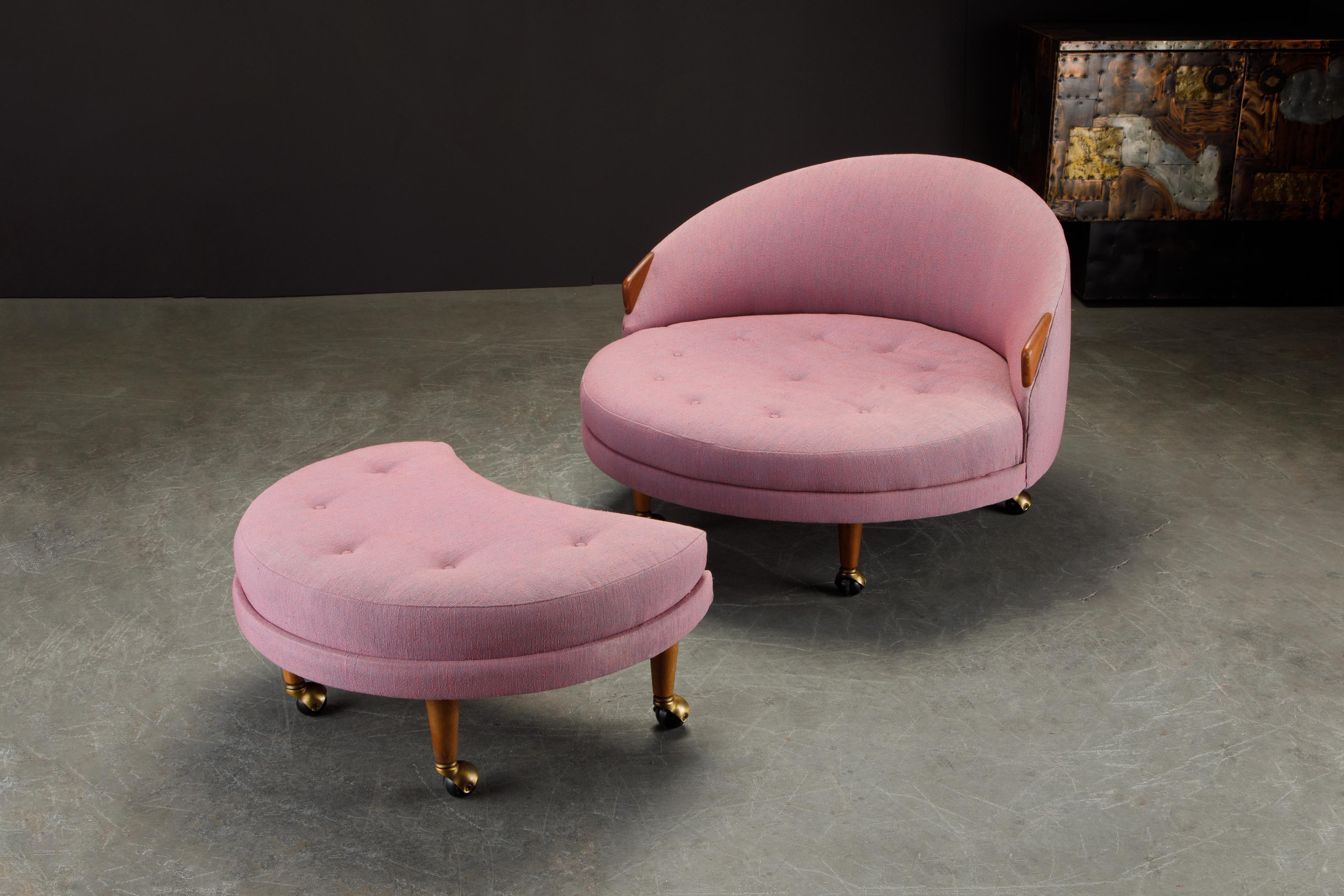 This large sized and spacious 'Havana' chair and ottoman by Adrian Pearsall was designed and produced in the 1960s.  This gorgeous example features a rose pink knit fabric with button tufted seats, walnut arms and legs with brass casters, and three