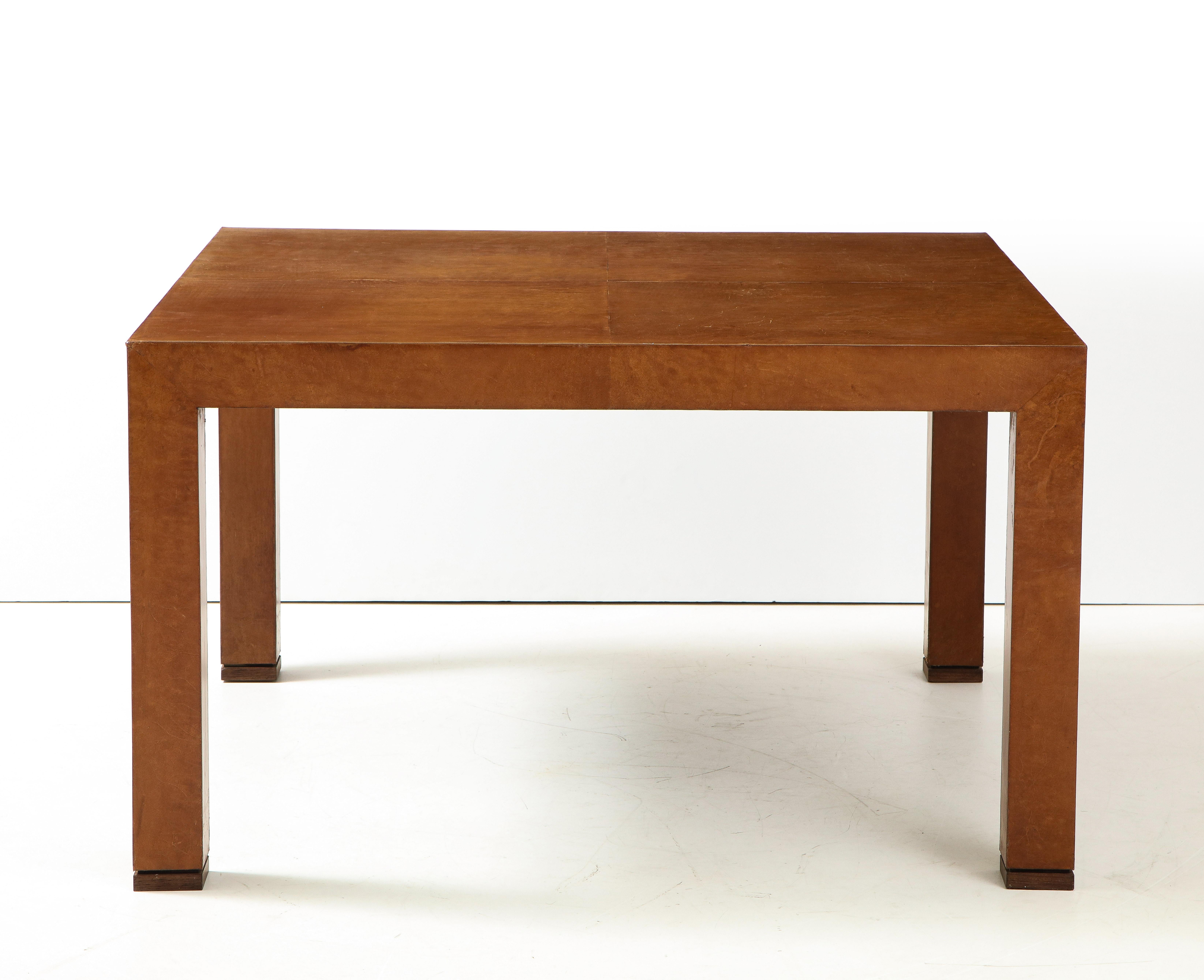 Havana leather dining table, France, c. 1960-70
Measures: H 29.5 D: 52 W: 52 in.
  