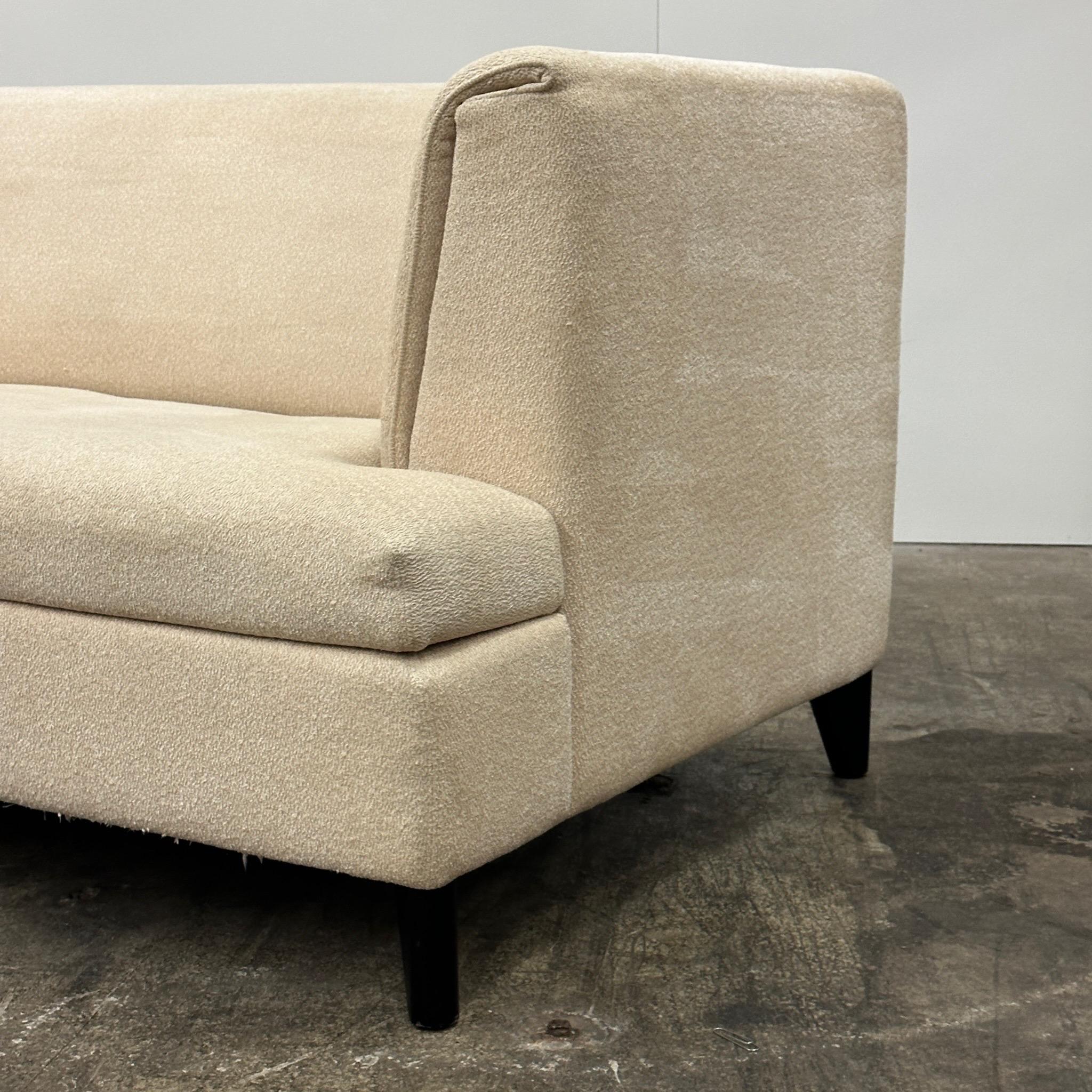 c.2000s. Upholstered in white fabric with black leg accents. Designed by Paolo Piva for Wittmann. 