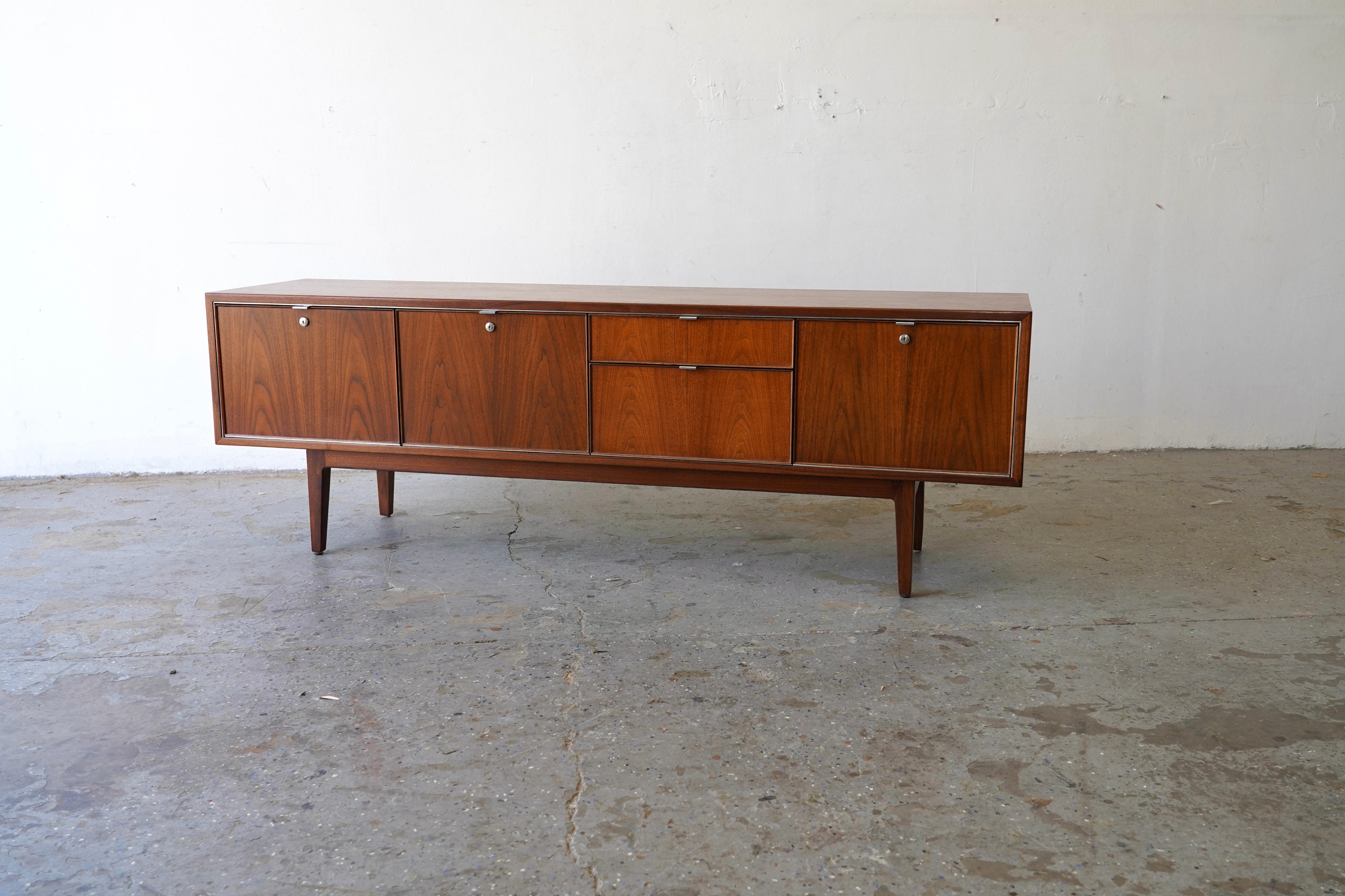 Cool Stow and Davis Midcentury Modern low credenza with two file drawers , two drawer and a  bar cabinet. This little work of art  would be perfect as a TV console as well. 

Professionally refinished. Drawers Freshened up.

Original aluminum