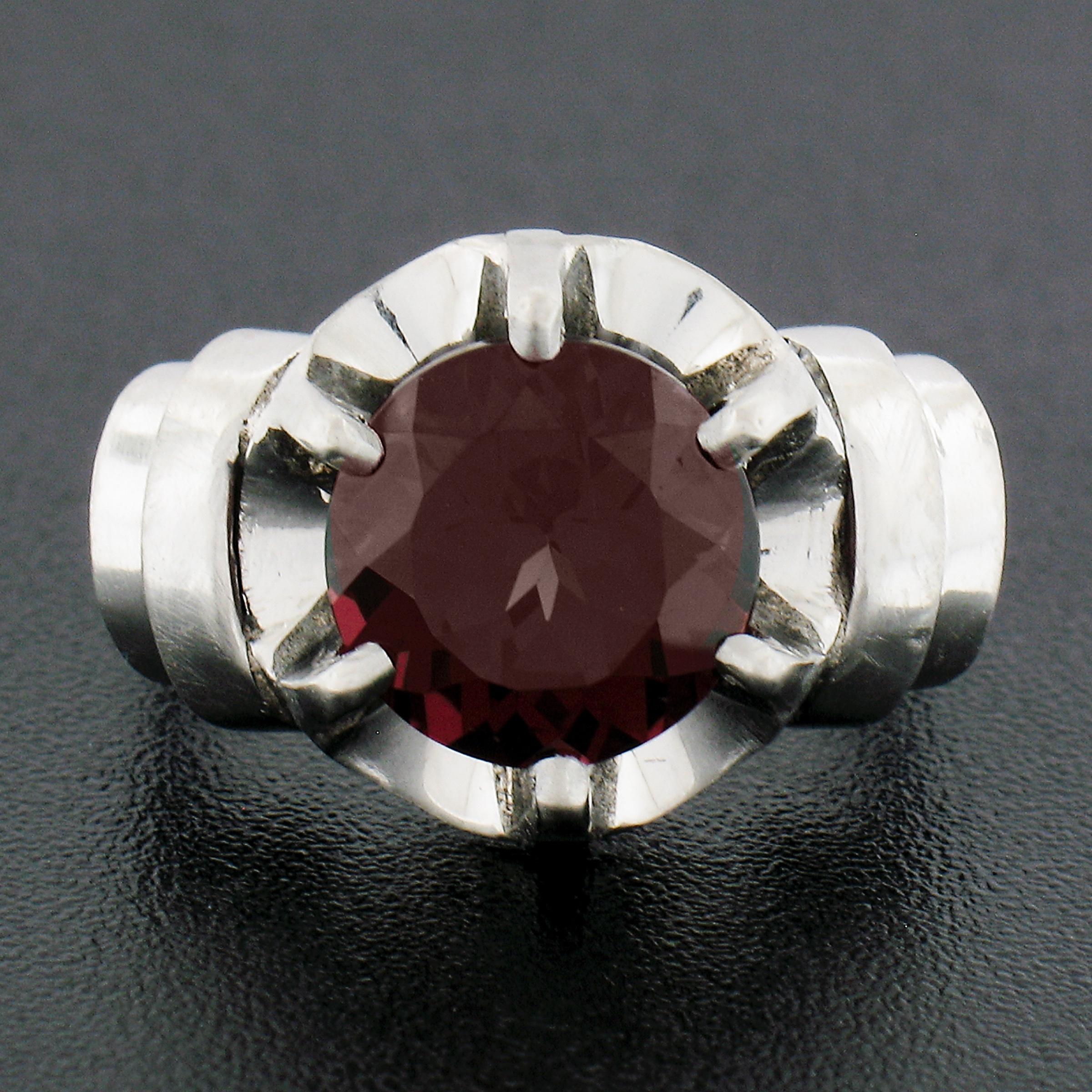 --Stone(s):--
(1) Natural Genuine Rhodolite Garnet - Round Cut - Buttercup Prong Set - Gorgeous Rich Red Color - 9mm (approx.) - 3.50ct (exact)

Material: Solid Platinum
Weight: 7.62 Grams
Ring Size: 4.5 (Fitted on a finger. We can custom size this