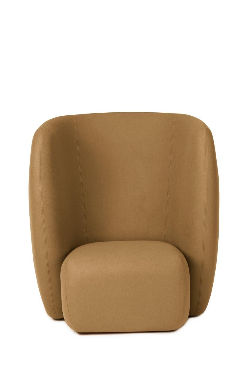 Haven lounge chair olive by Warm Nordic
Dimensions: D107 x W84 x H 110 cm
Material: Textile upholstery, foam, spring system, wood.
Weight: 50 kg
Also available in different colours and finishes.

The Haven armchair is a contemporary chair with