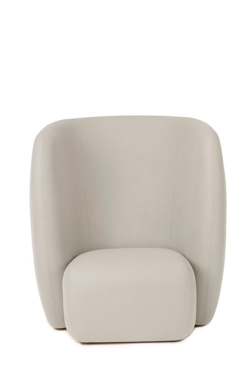 Haven Lounge chair pearl grey by Warm Nordic
Dimensions: D107 x W84 x H 110 cm
Material: Textile upholstery, Foam, Spring system, Wood.
Weight: 50 kg
Also available in different colours and finishes. 

The Haven armchair is a contemporary