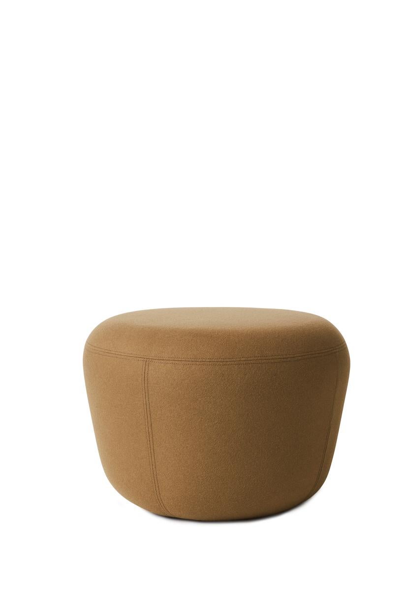 Haven Olive pouf by Warm Nordic
Dimensions: D57 x H 40 cm
Material: Textile upholstery, Foam, Wood.
Weight: 9.5 kg
Also available in different colours and finishes. 

The Haven Pouf is a contemporary pouf with a simple, soft idiom. The Haven