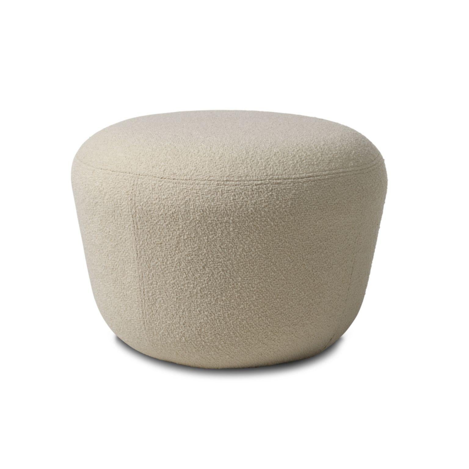 Haven Sand Pouf by Warm Nordic
Dimensions: D57 x H 40 cm
Material: Textile upholstery, Foam, Wood.
Weight: 9.5 kg
Also available in different colours and finishes. Please contact us.

The Haven Pouf is a contemporary pouf with a simple, soft