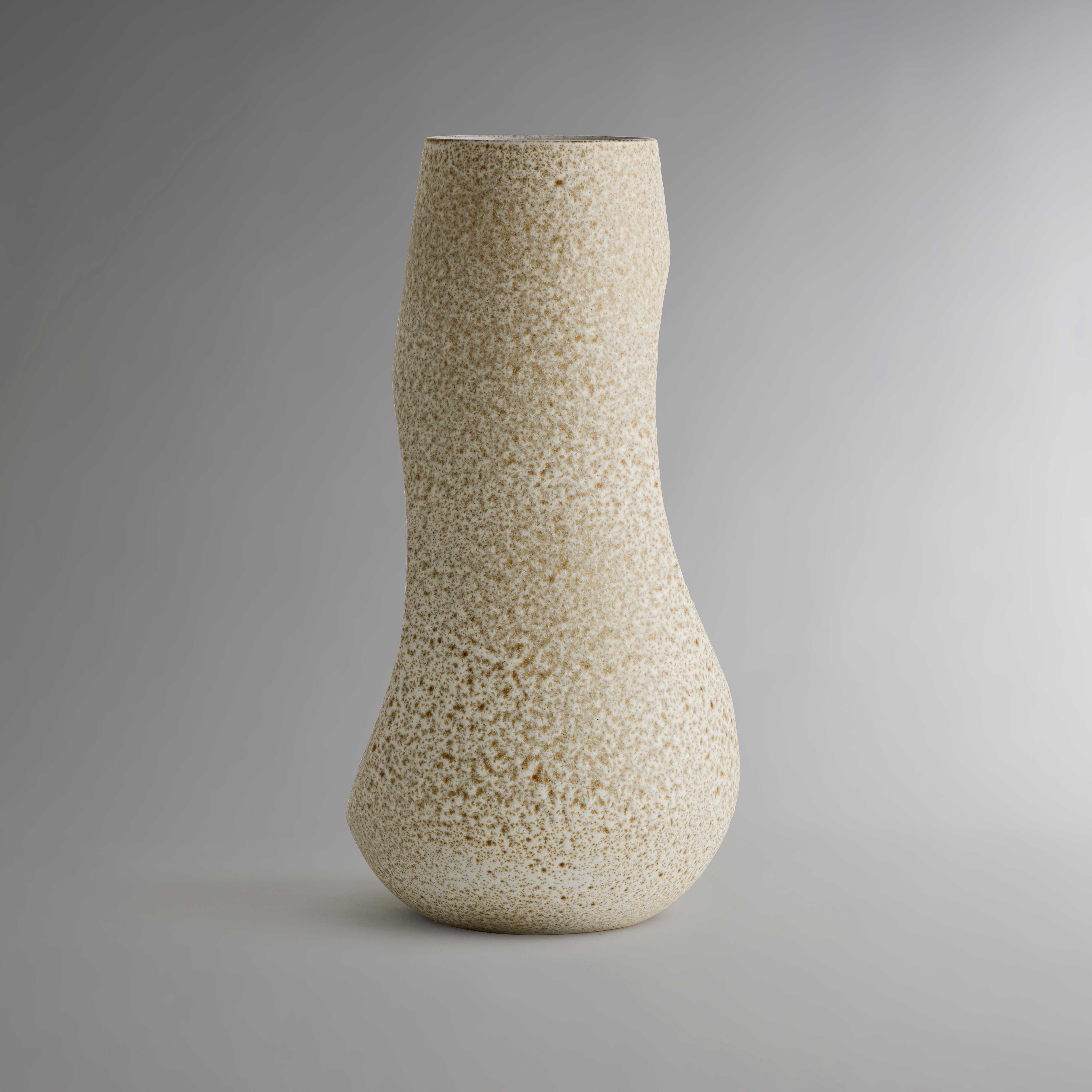 Handcrafted from natural clay, this organic vase embraces the charm of a desert succulent with geometric etchings and petite spikes. The aquamarine glaze hints at the CACTI Vase’s tawny earthenware form within each etched crevice. A beautiful