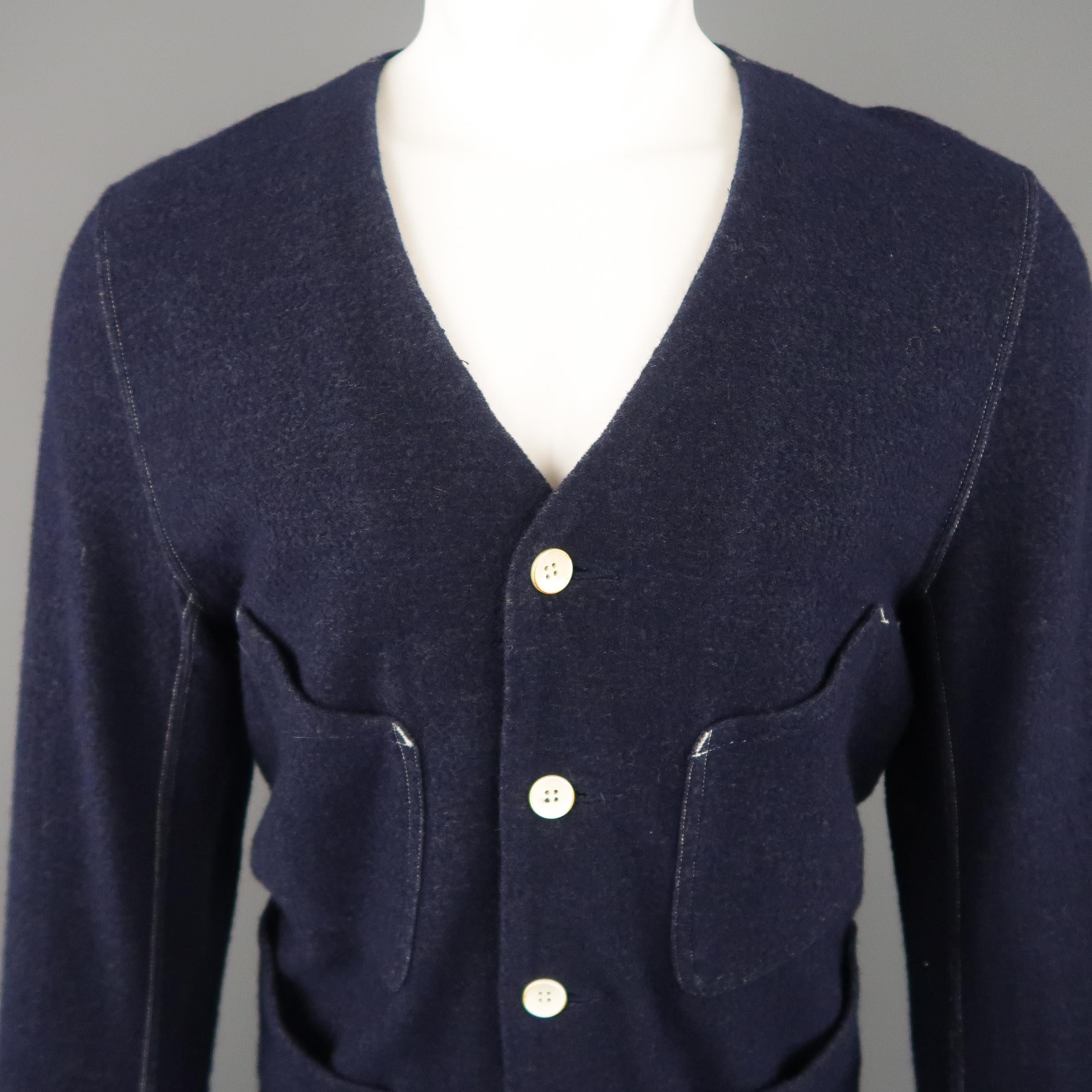 HAVER SACK  jacket comes in navy textured knit with a deep V neckline, patch pockets, and contrast stitching throughout. Made in Japan.
 
Excellent Pre-Owned Condition.
Marked: M
 
Measurements:
 
Shoulder: 18 in.
Chest: 42 in.
Sleeve: 26