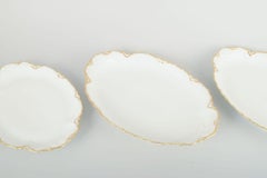 Haviland, France. Ensemble de trois plats ovales en porcelaine. 1940s