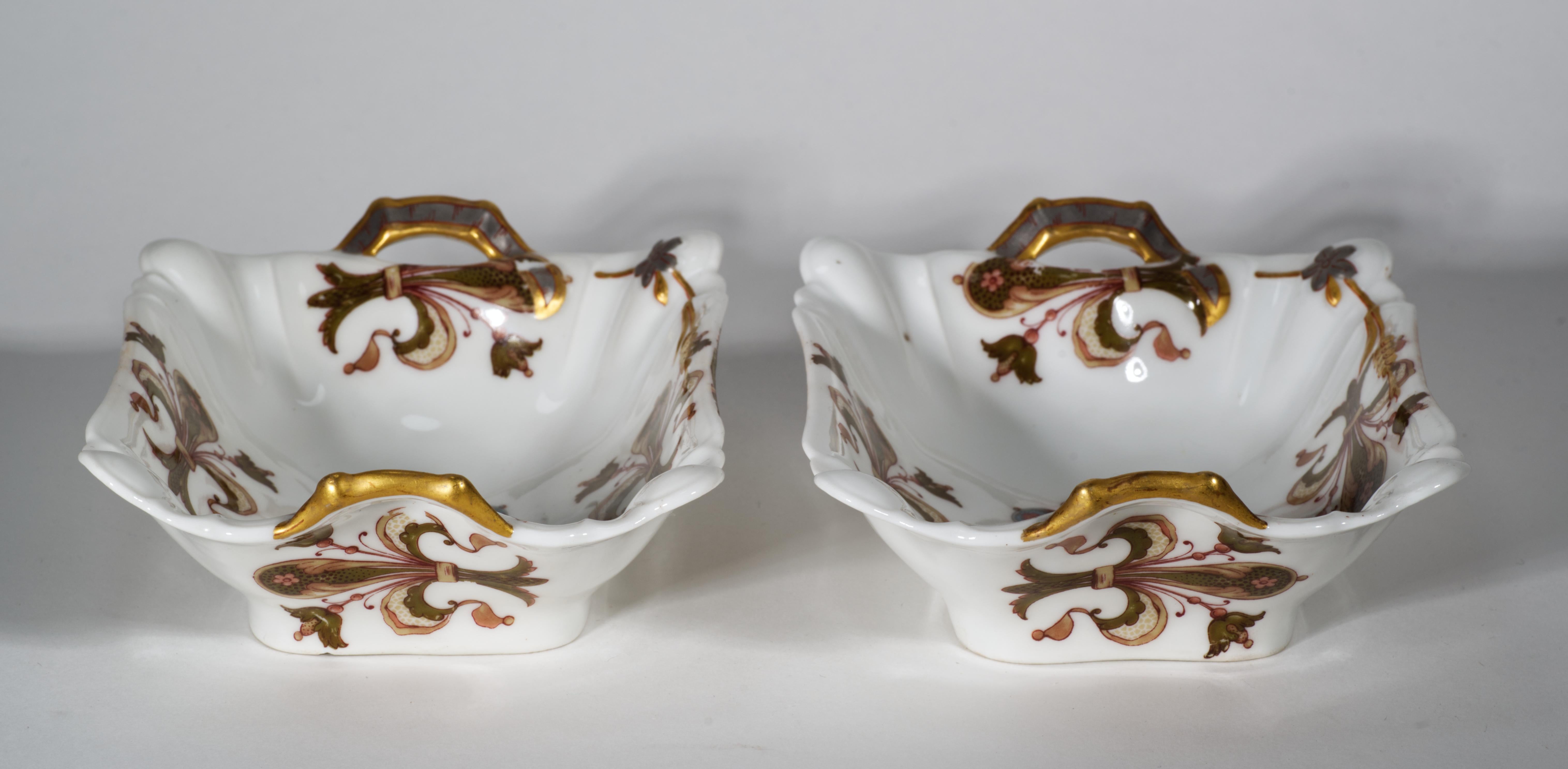  Small serving bowls with handles feature an unusual Aesthetic style decor in beige, blue, and grey with gold accents. Highly ornamental blanks with complex fold details on corners and handles have a relief decor of abstract flower on a branch on