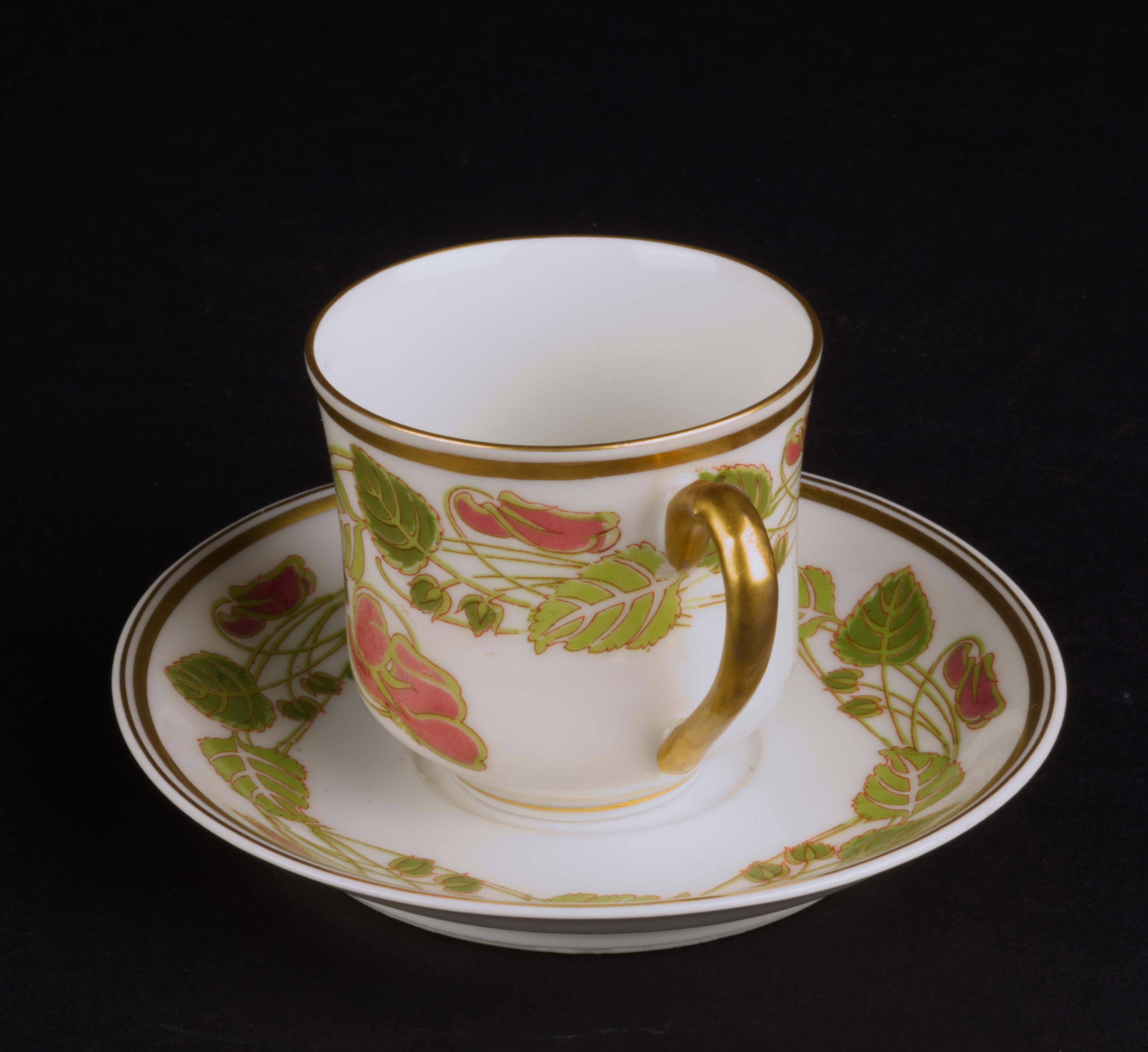 Haviland Limoges demitasse cup and saucer set was made for Wright Tindale & Van Roden, high end store in Philadelphia that specialized in selling English and Limoges porcelain in 1880-1930s. MET Museum has two of the store's catalogues in its