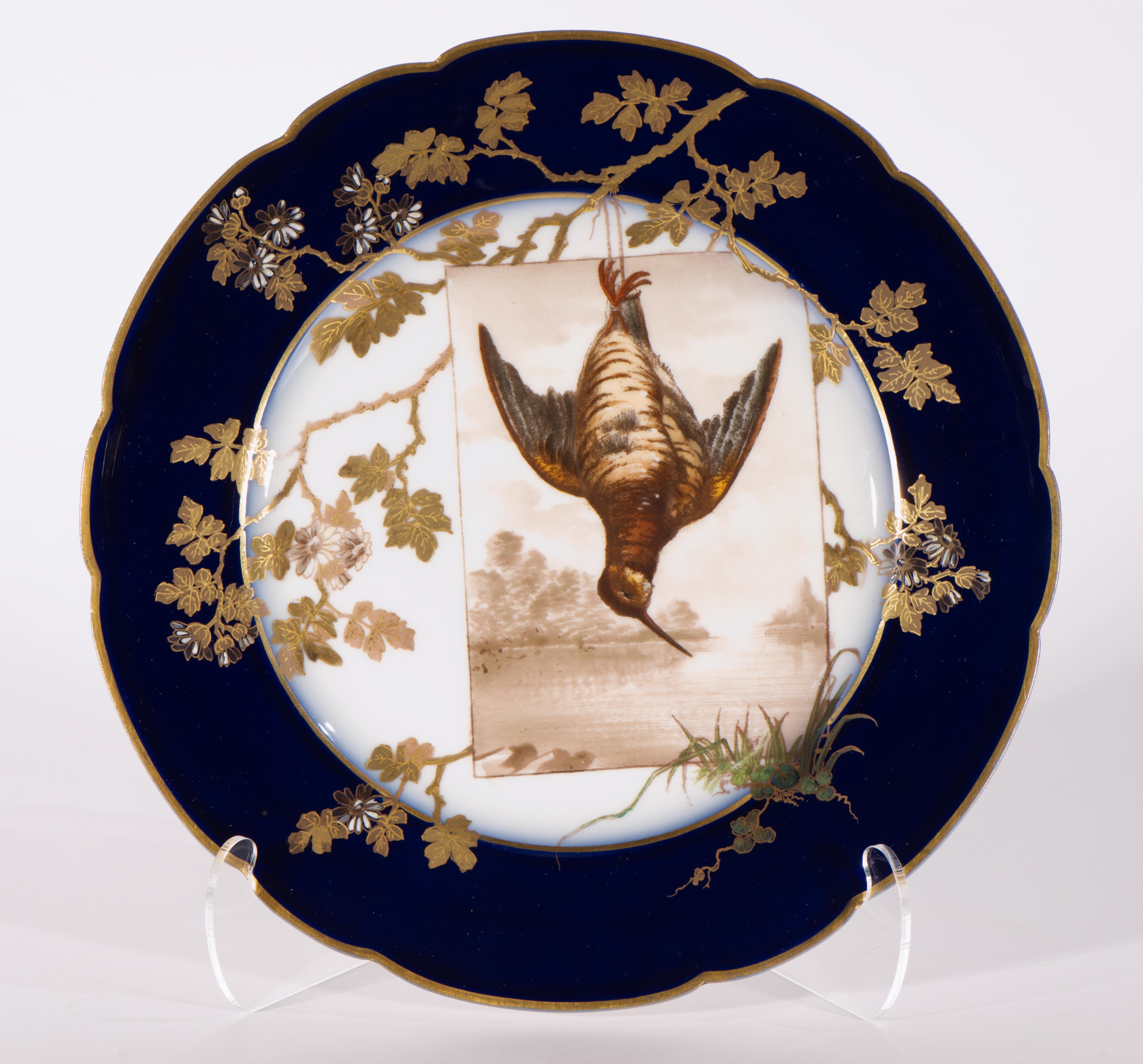 Antique set of 2 square and one round porcelain plates was created by Charles Field Haviland in late 19th century as a part of a big service; the game bird decor indicates that the plates would be used for the wild birds or venison course. With the
