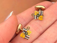 Gemelos con el escudo de Hawái, de oro amarillo de 14 quilates