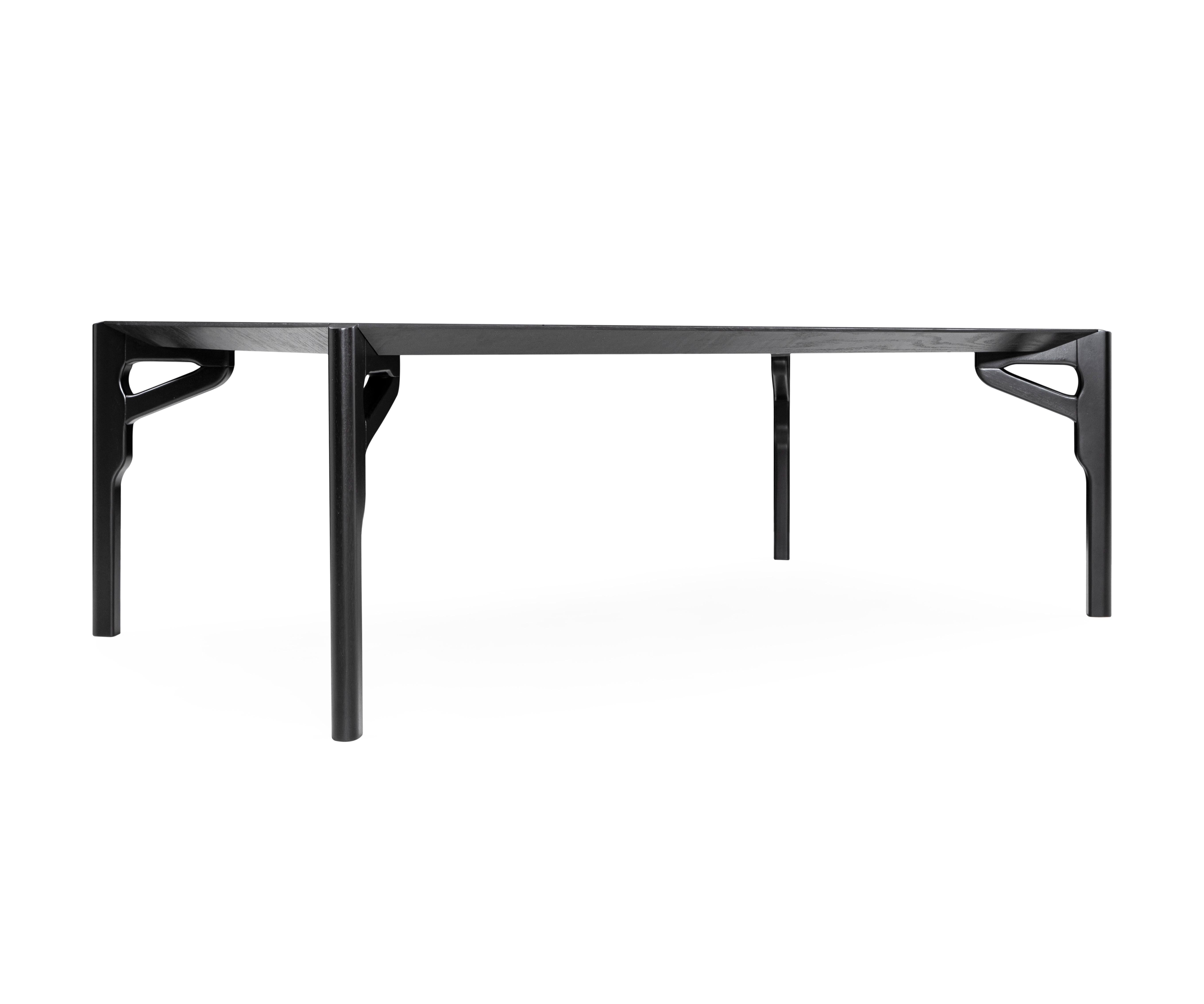 The Hawk dining table has been designed by our Uultis Design team with a black finish oak table, the perfect addition to any dining room. It is a sophisticated table for modern contemporary decor, inspired by Brazilian culture. The large tabletop