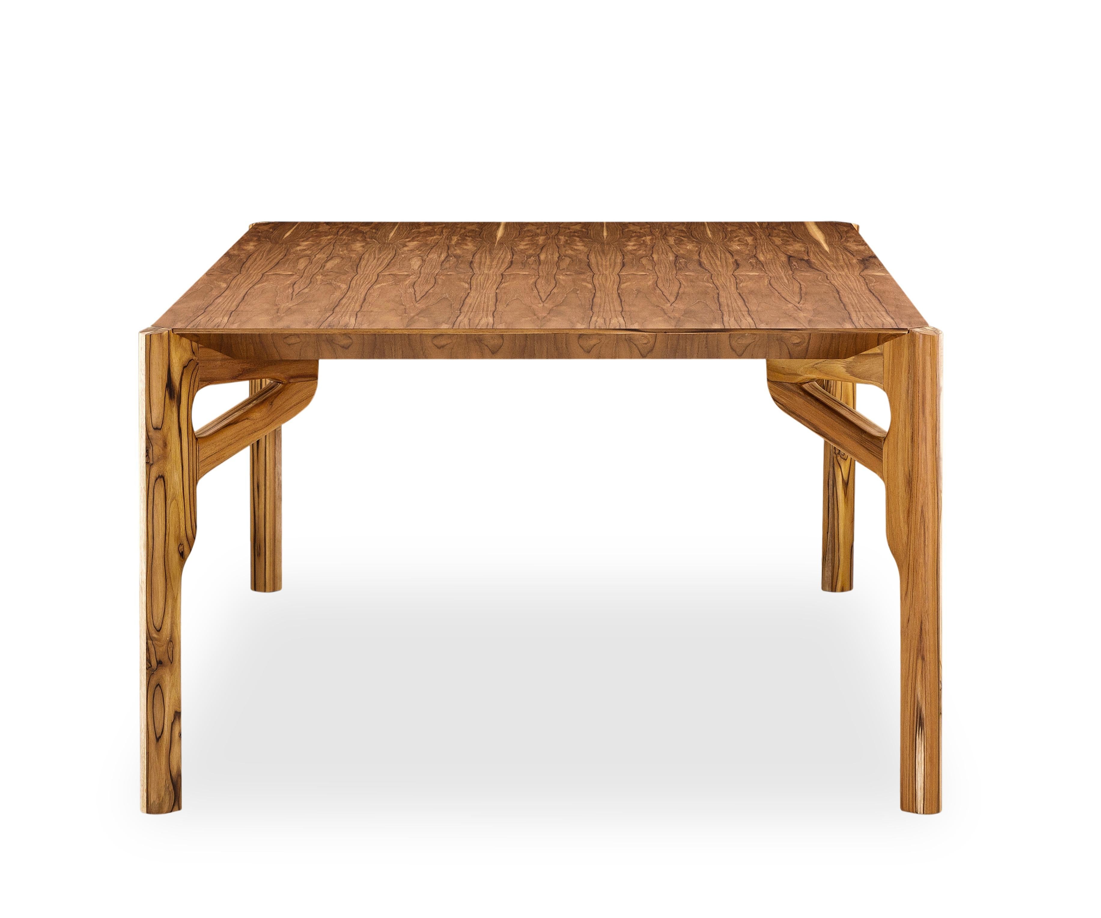 The Hawk dining table has been designed by our Uultis Design team with a teak finish veneered table, the perfect addition to any dining room. It is a sophisticated table for modern contemporary decor, inspired by Brazilian culture. The large