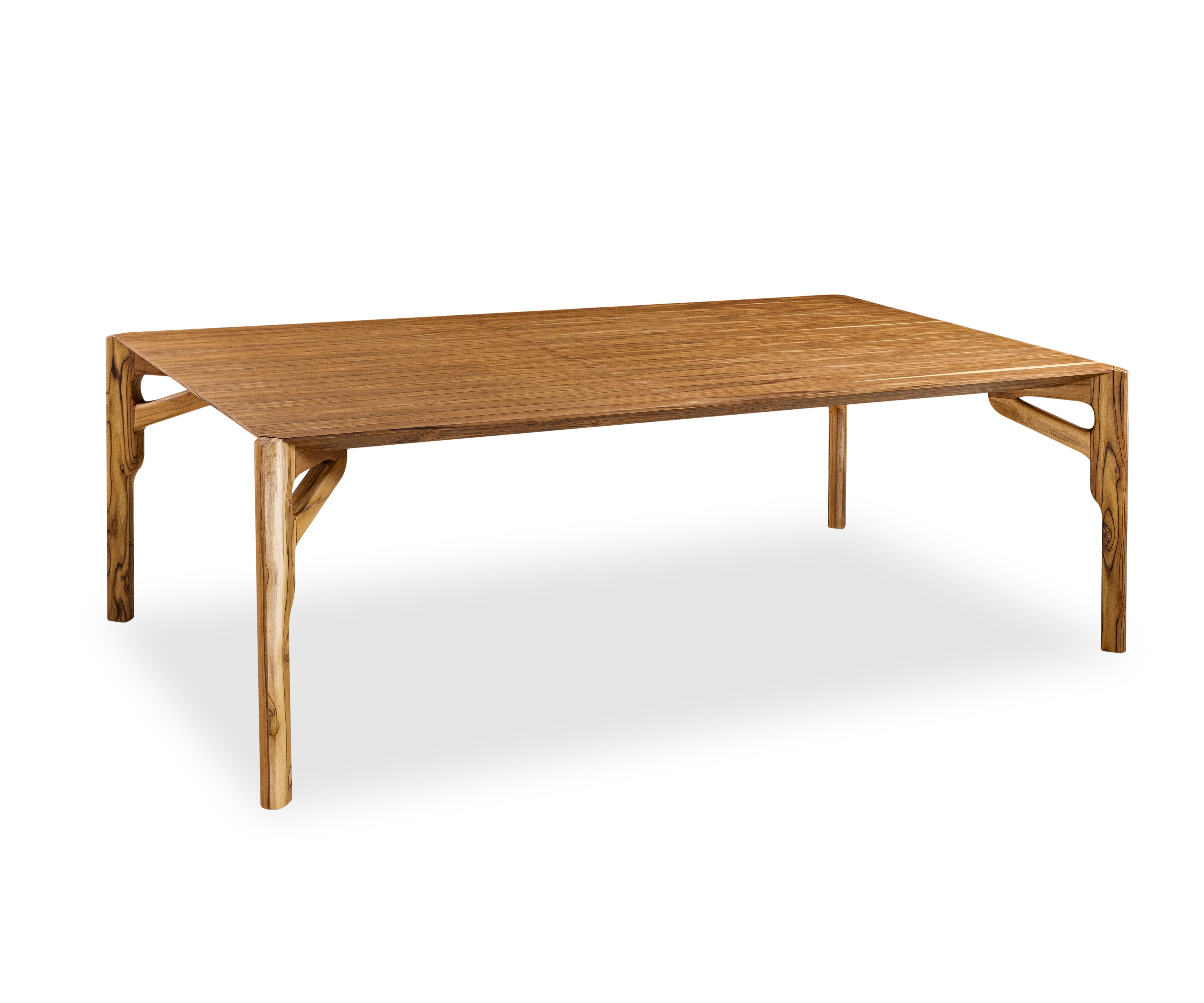 Brazilian Hawk Dining Table with a Teak Wood Veneered Table Top 70'' For Sale