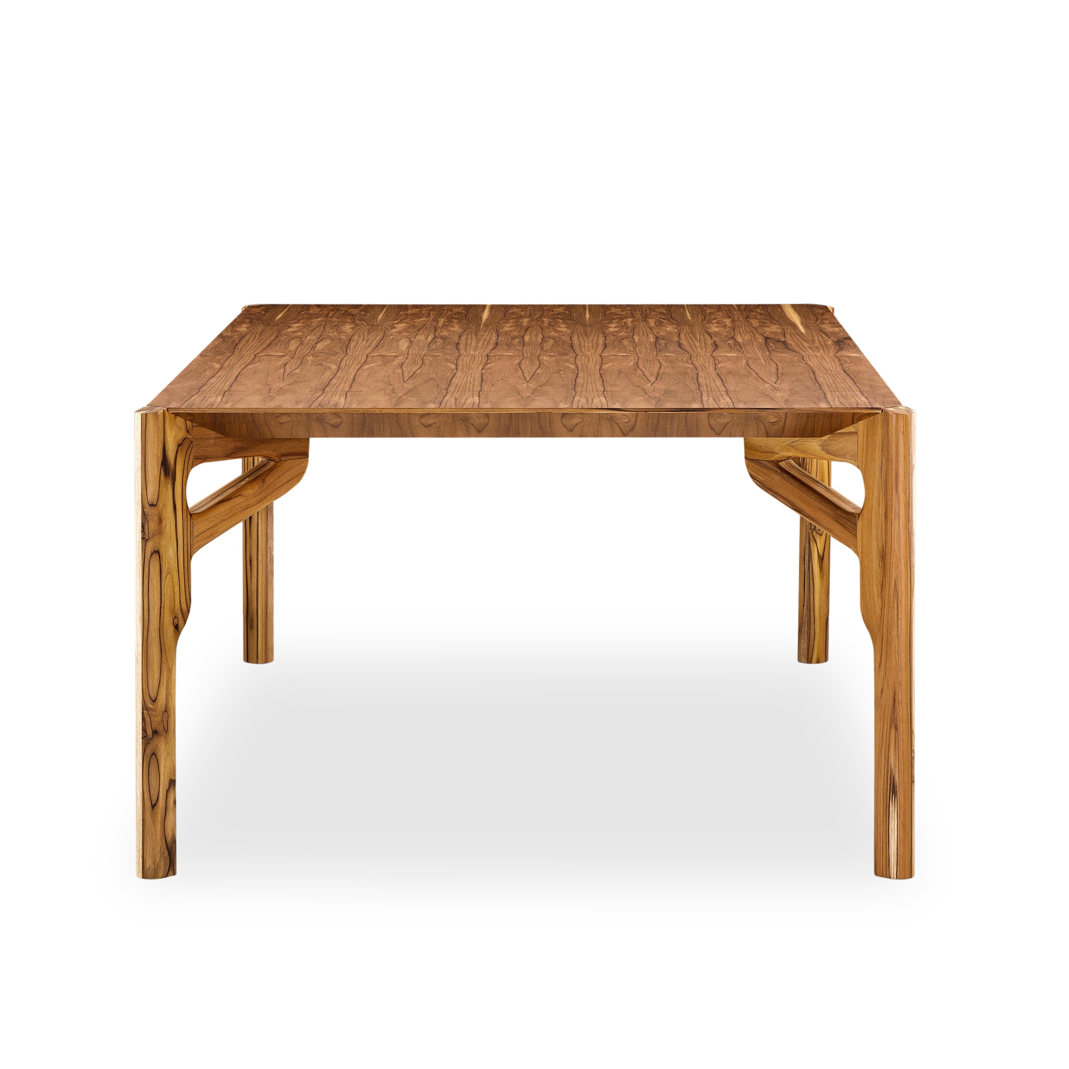 The Hawk dining table has been designed by our Uultis Design team with a teak finish veneered table, the perfect addition to any dining room. It is a sophisticated table for modern contemporary decor, inspired by Brazilian culture. The large