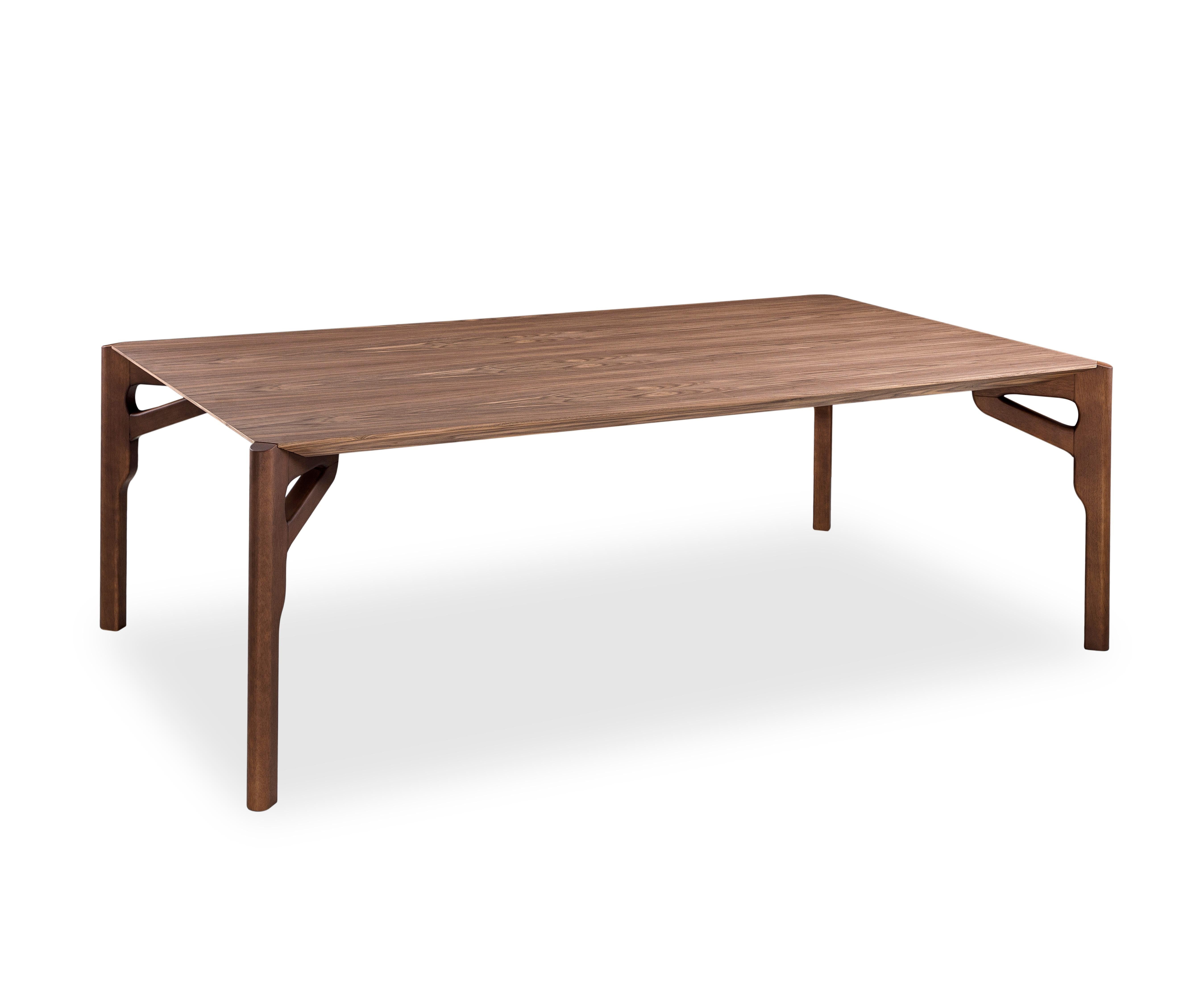 The Hawk dining table has been designed by our Uultis Design team with a walnut finish veneered table, the perfect addition to any dining room. It is a sophisticated table for modern contemporary decor, inspired by Brazilian culture. The large