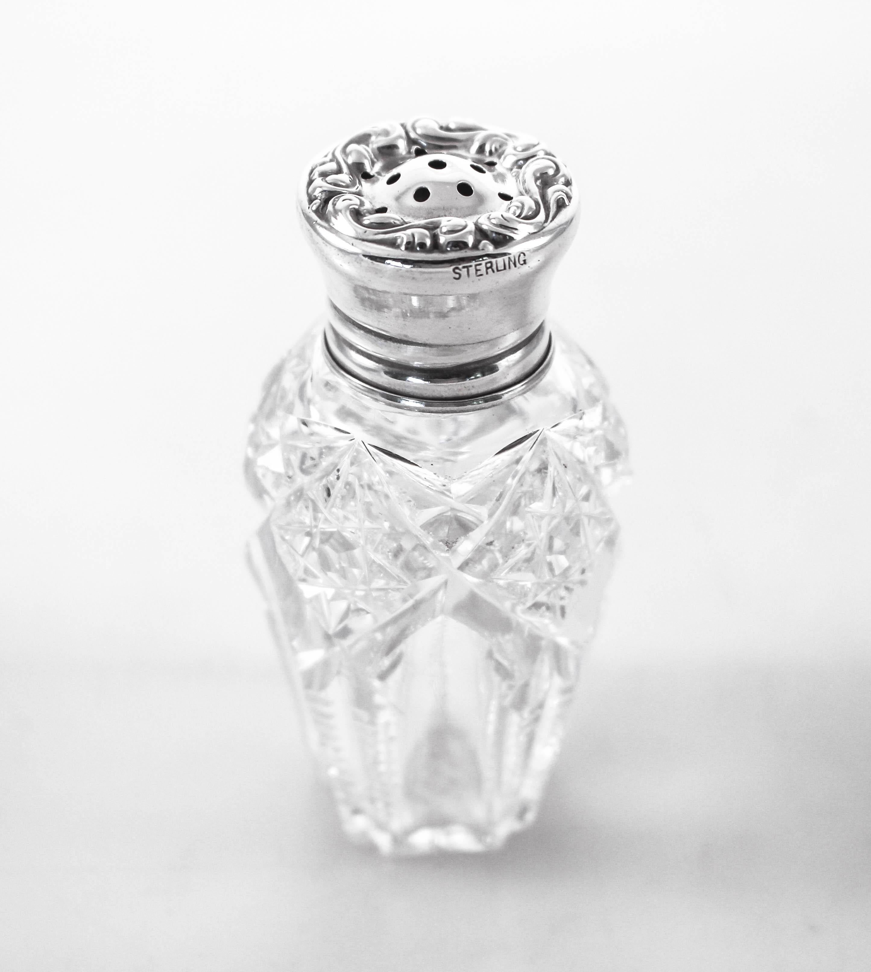 We are happy to offer this pair of sterling silver and cut-glass salt and pepper shakers by the famous Hawkes Glass Company.
Based in Corning, NY, T.G. Hawkes & Co. (circa 1880-1959) was established by Thomas Gibbons Hawkes. Born in Ireland, Hawkes