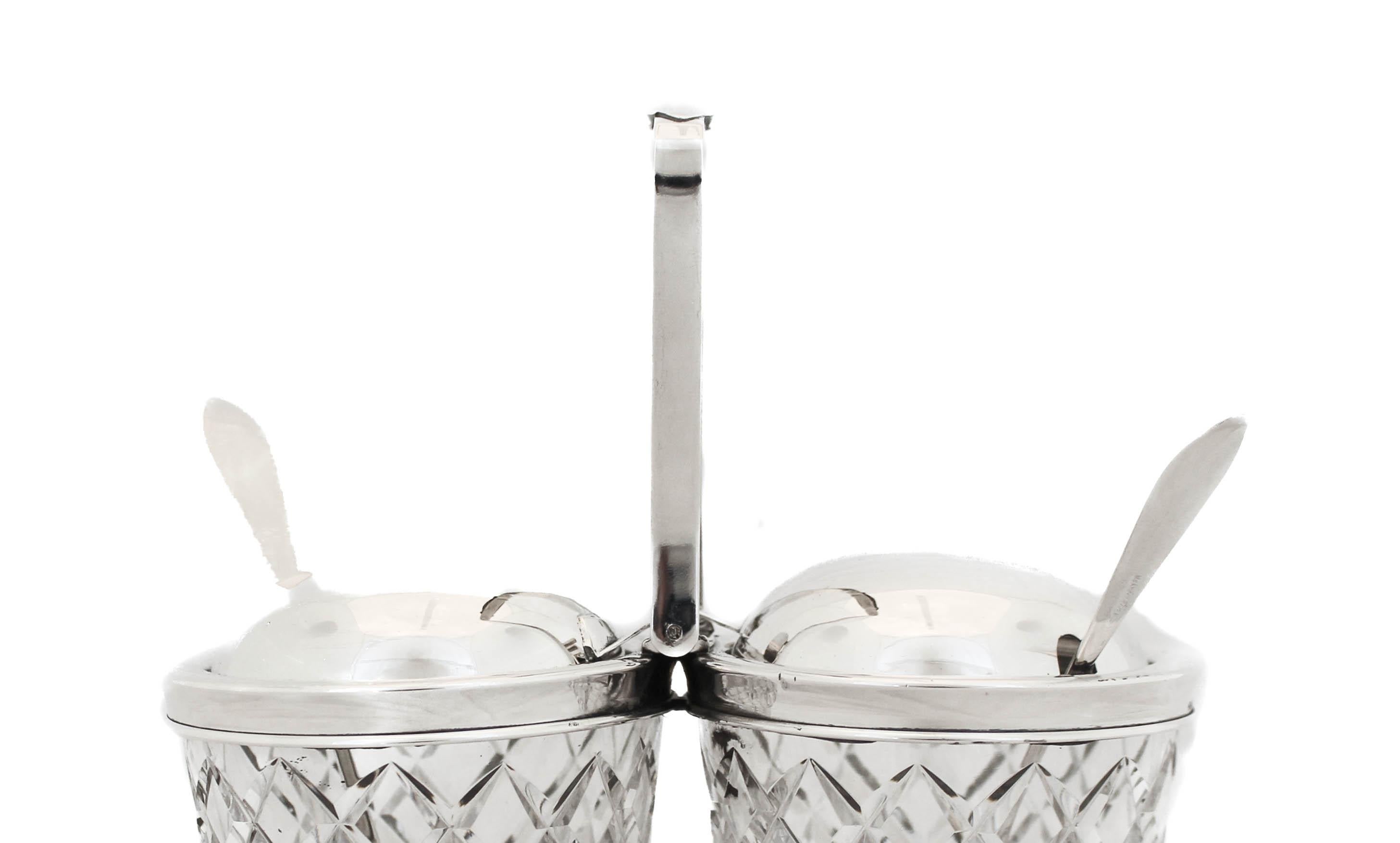 We are thrilled to offer you this rare sterling silver and crystal double condiment holder made by the Hawkes Glass Company. Based in Corning, NY, T.G. Hawkes & Co. (c.1880-1959) was established by Thomas Gibbons Hawkes (1846-1913). Born in Ireland,