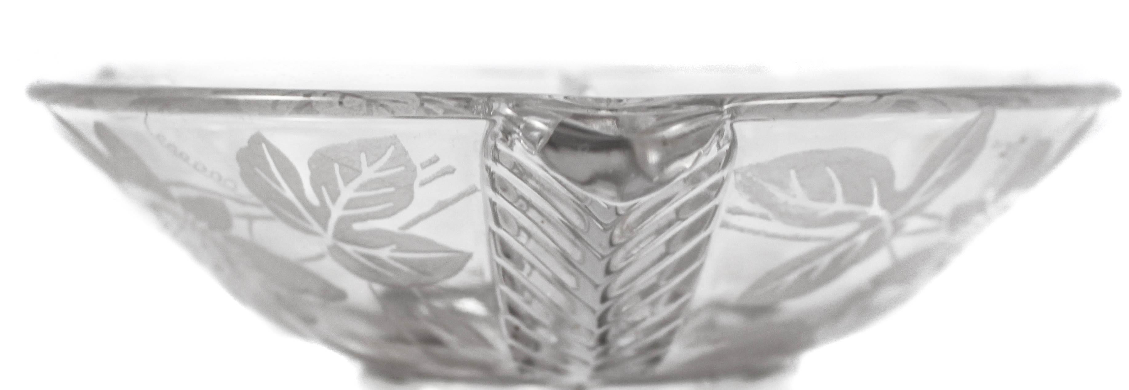 We are offering this crystal sectional with a sterling silver base by the Hawkes Glass Company.
Based in Corning, NY, T.G. Hawkes & Co. (c.1880-1959) was established by Thomas Gibbons Hawkes (1846-1913). Born in Ireland, Hawkes immigrated to