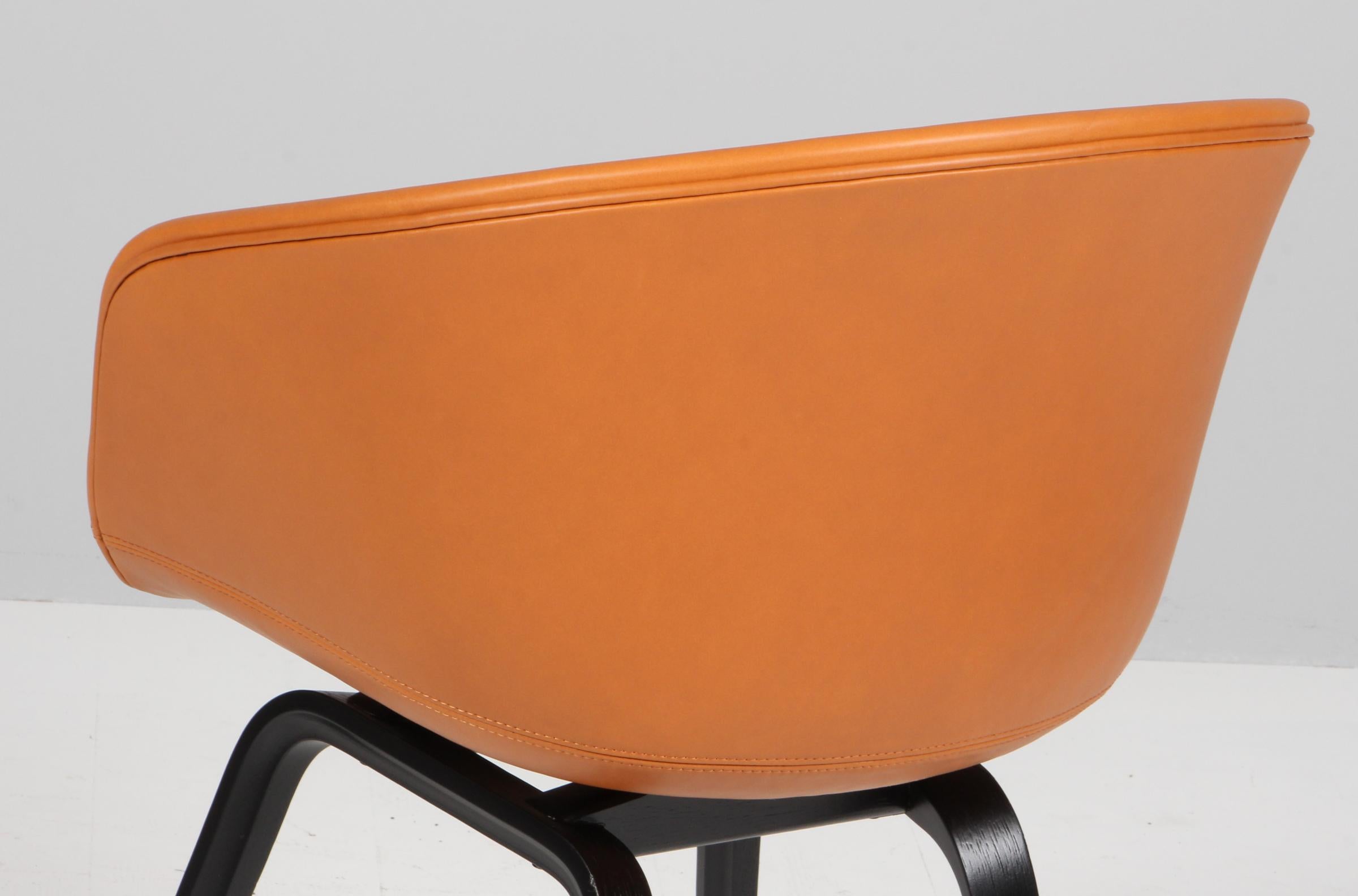 Contemporary Hay dining chaurs model AAC22, Black stained oak and cognac silk aniline leather For Sale