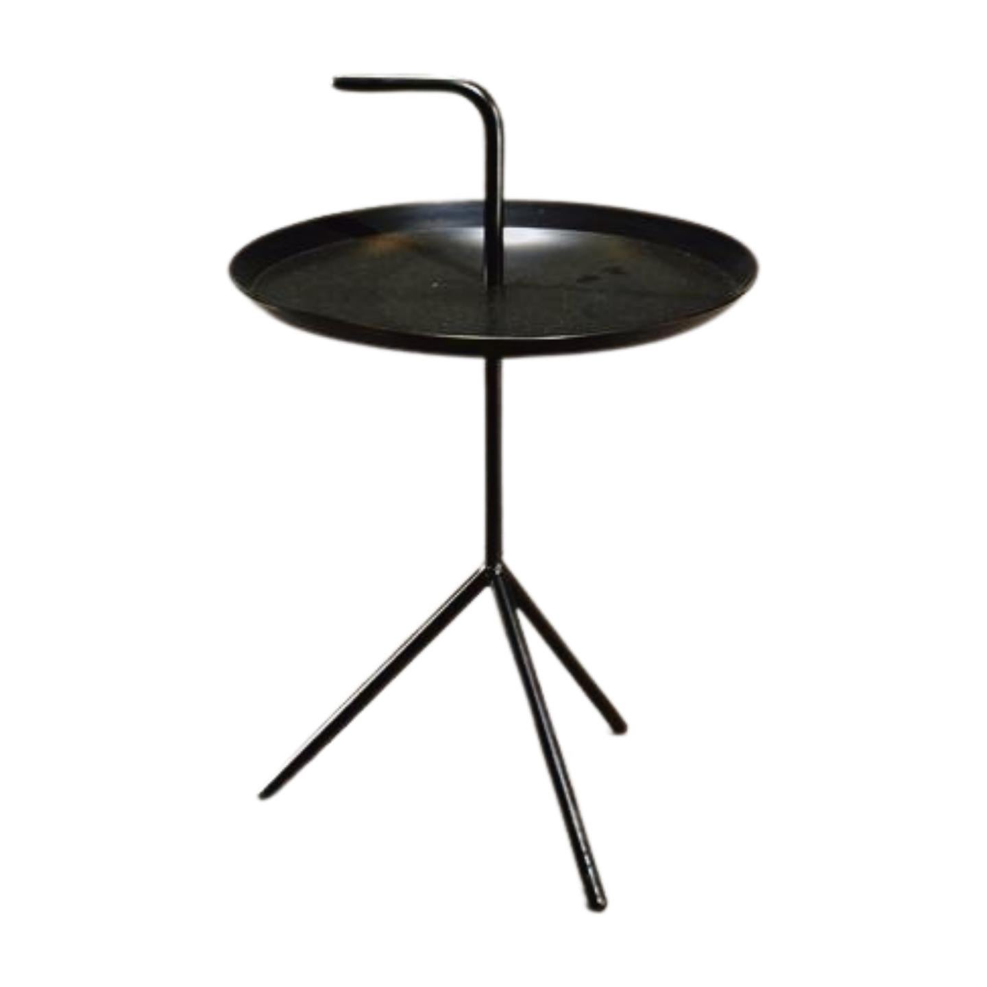 The Hay DLM Side Table is a versatile and practical piece. Designed by the renowned Danish brand Hay, this table is portable and features a contemporary style. Its handle allows for easy mobility, making it a perfect addition to any living space for