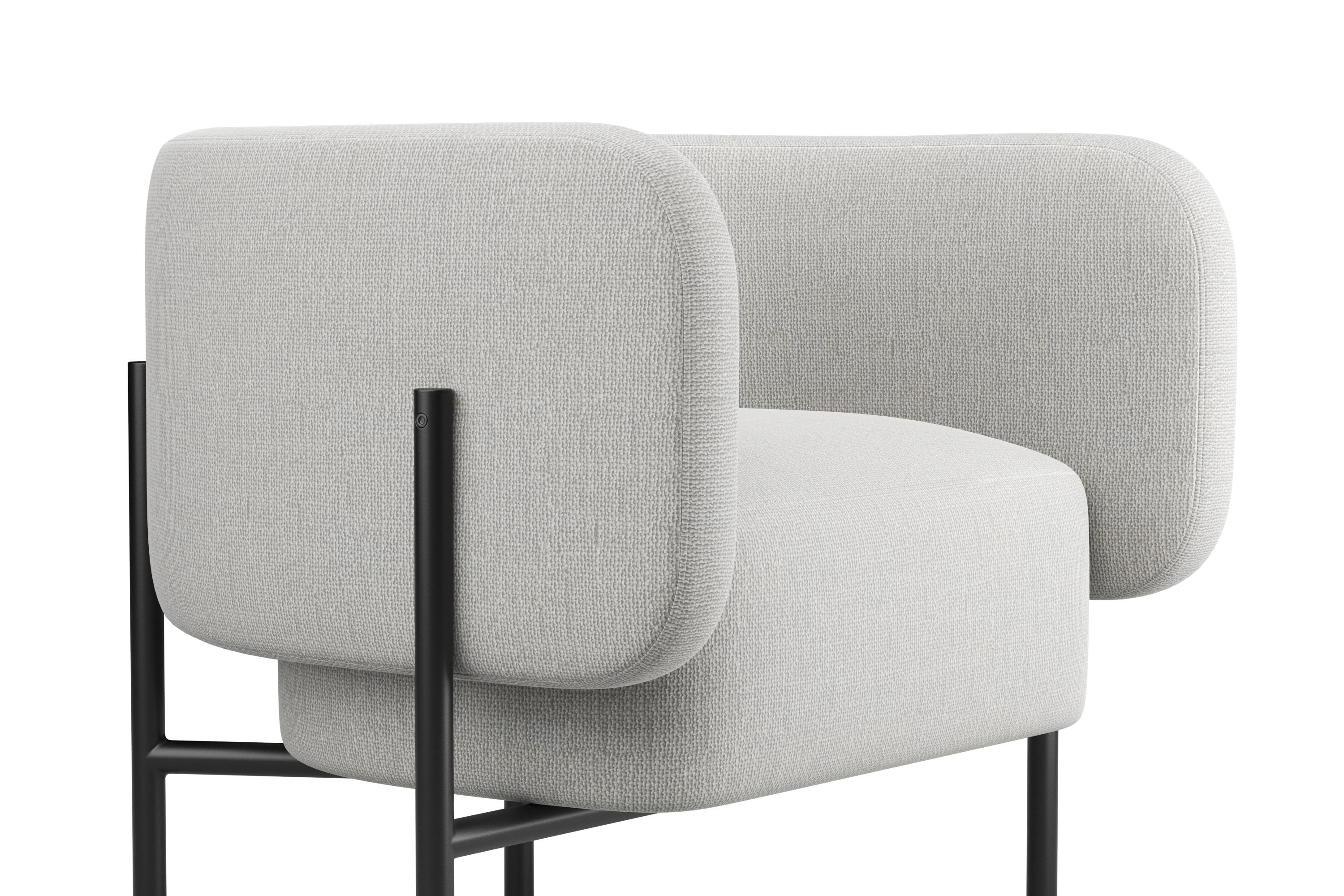 The Abrazo Armchair, translating to 